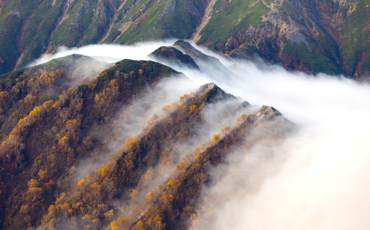Scenic mountain path with views of Japanese alpine landscape