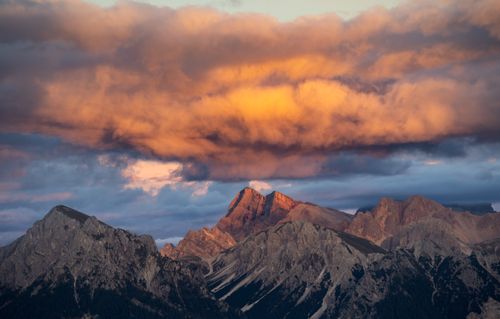 Free Stunning view of the Dolomite peaks under a colorful sunset sky. Stock Photo