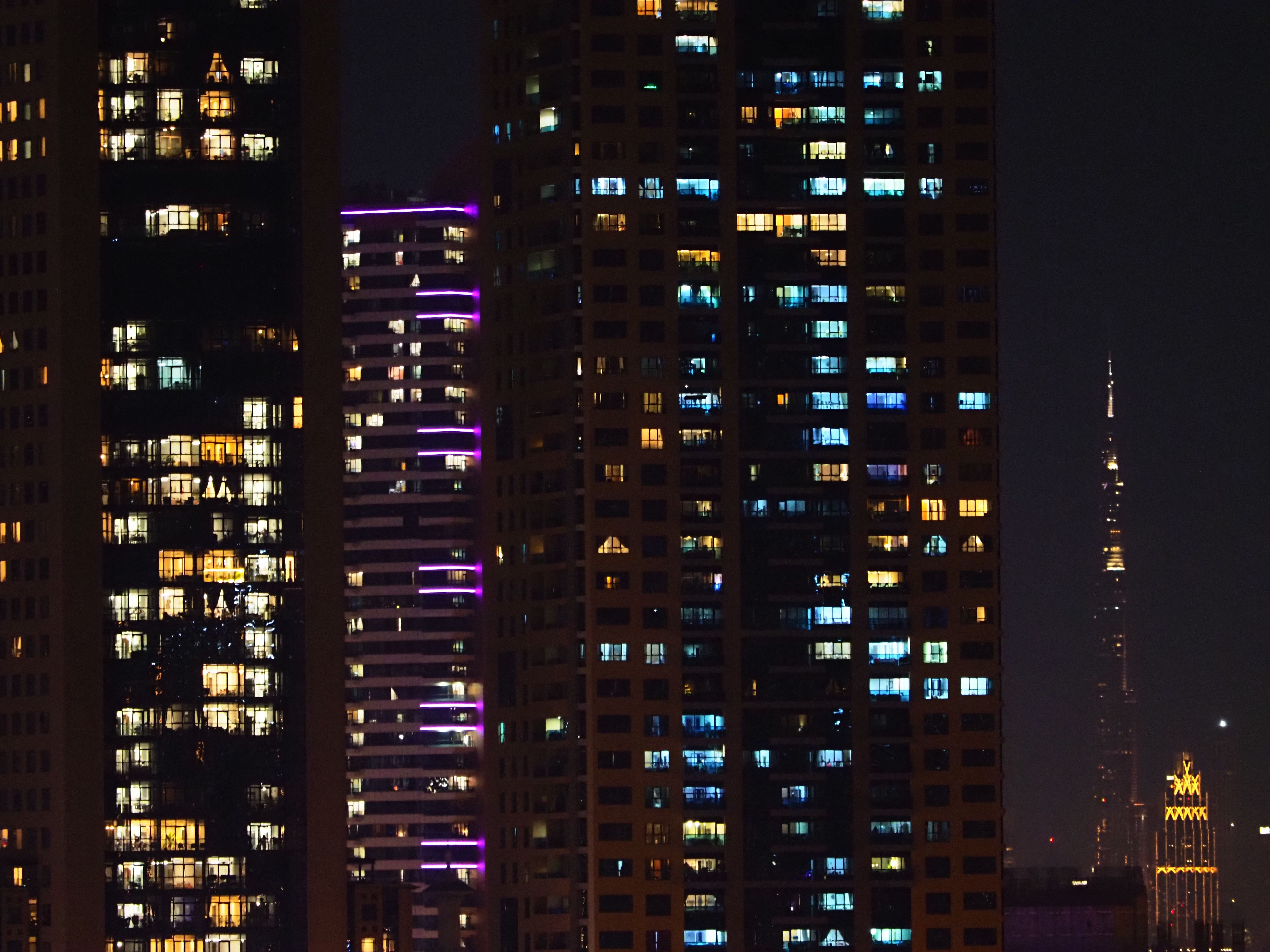 Night Cityscape with Illuminated Skyscrapers · Free Stock Photo