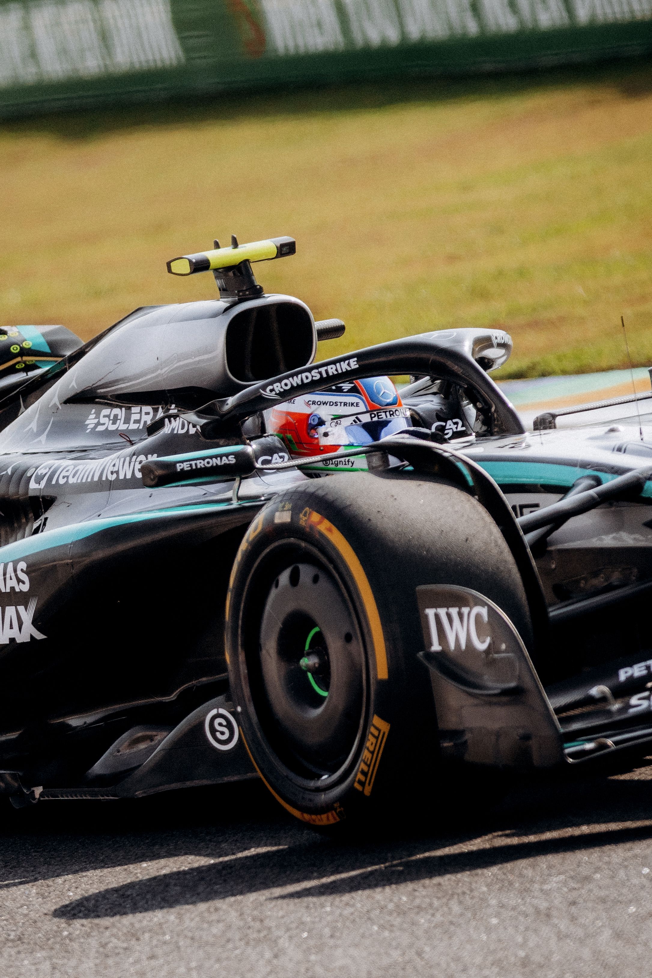 High-Speed Formula 1 Racing at Interlagos · Free Stock Photo