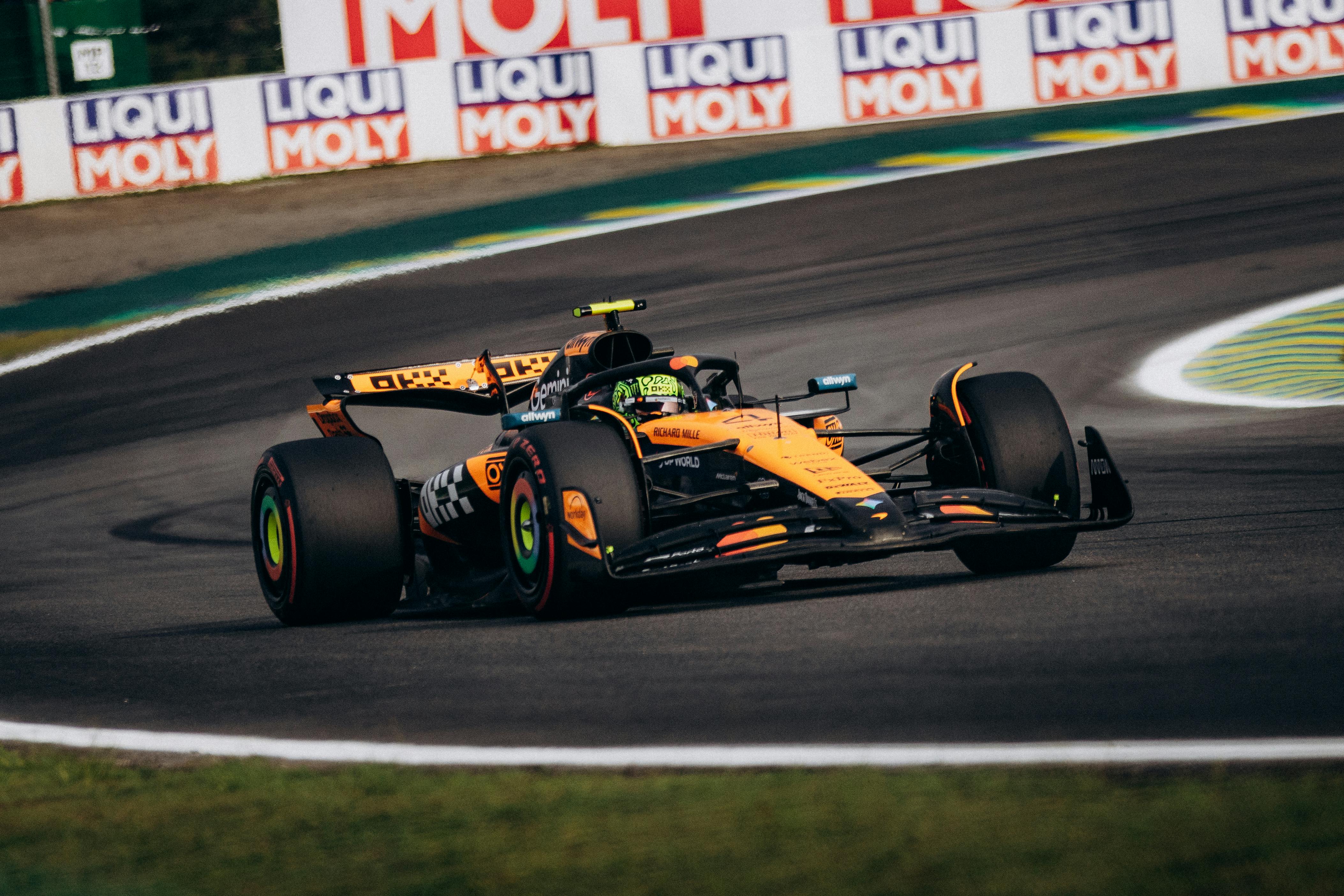 High-Speed Formula 1 Race Car at Interlagos Track · Free Stock Photo