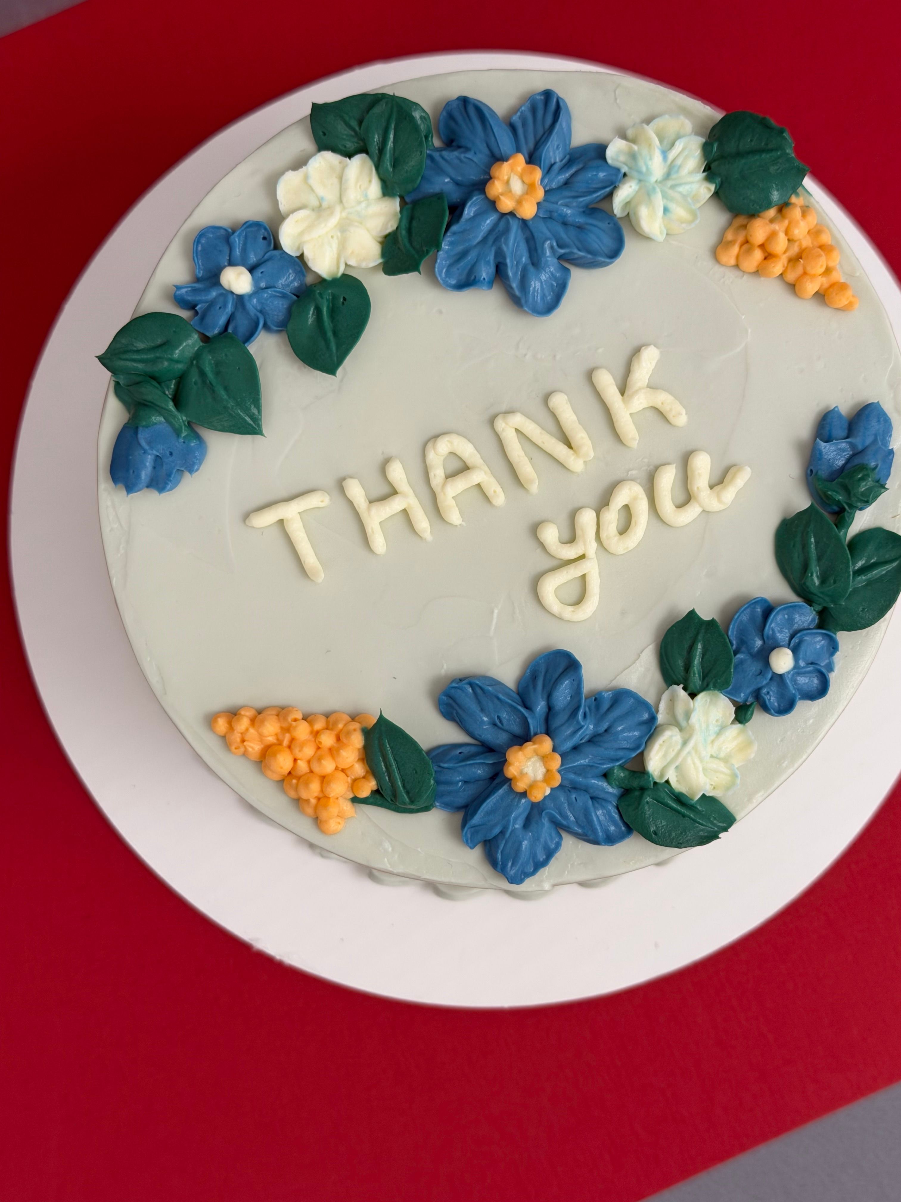 Decorative Thank You Cake with Floral Design · Free Stock Photo