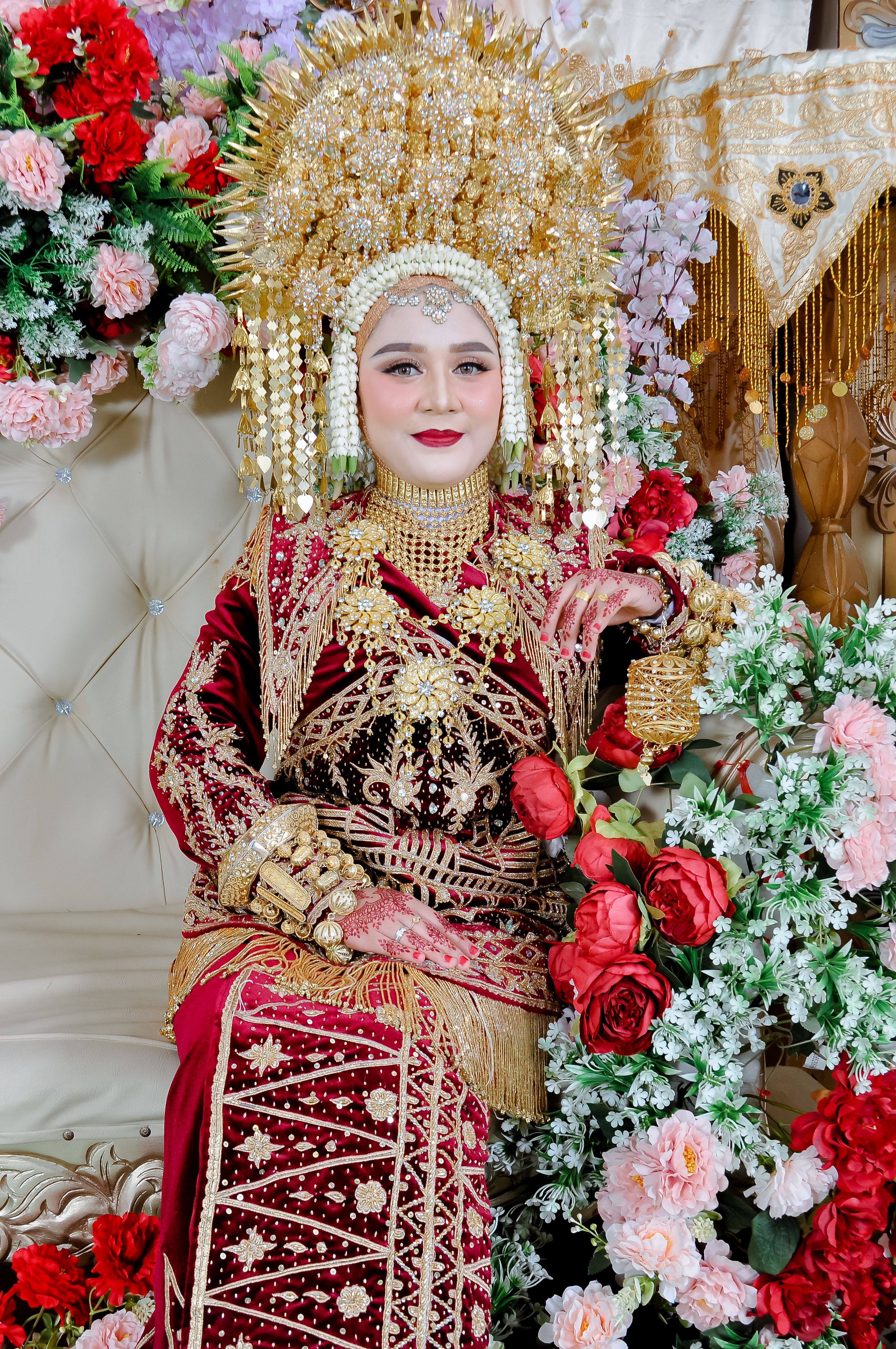 Traditional Indonesian Bridal Portrait with Floral Decor