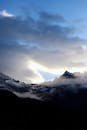 Dramatic Snow-Capped Mountains at Dawn