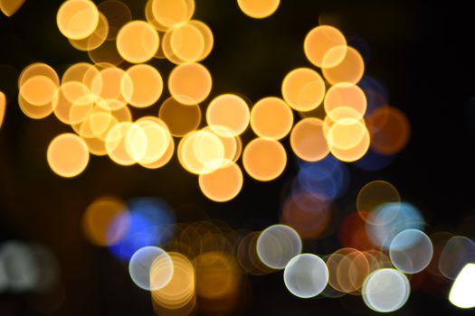 Vibrant bokeh image showing colorful circular light patterns in abstract style.
