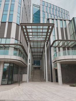 Contemporary architecture at the Trilliant building entrance in Tashkent, Uzbekistan.