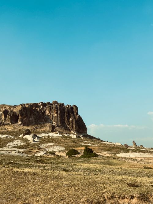 Free A magnificent rocky landscape with a clear blue sky, evoking a sense of tranquility and adventure. Stock Photo