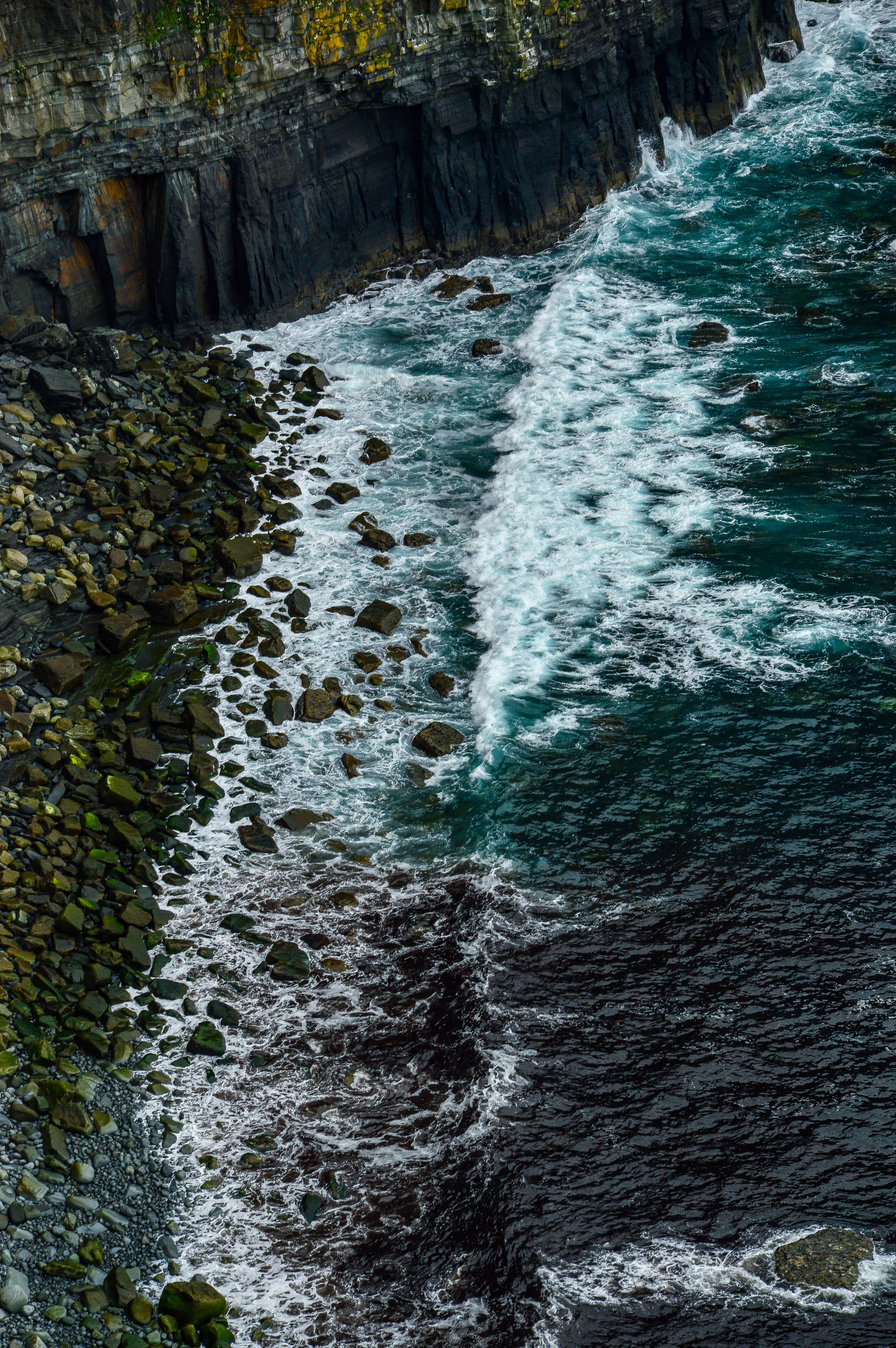 Dramatic Rocky Coastline with Crashing Waves · Free Stock Photo