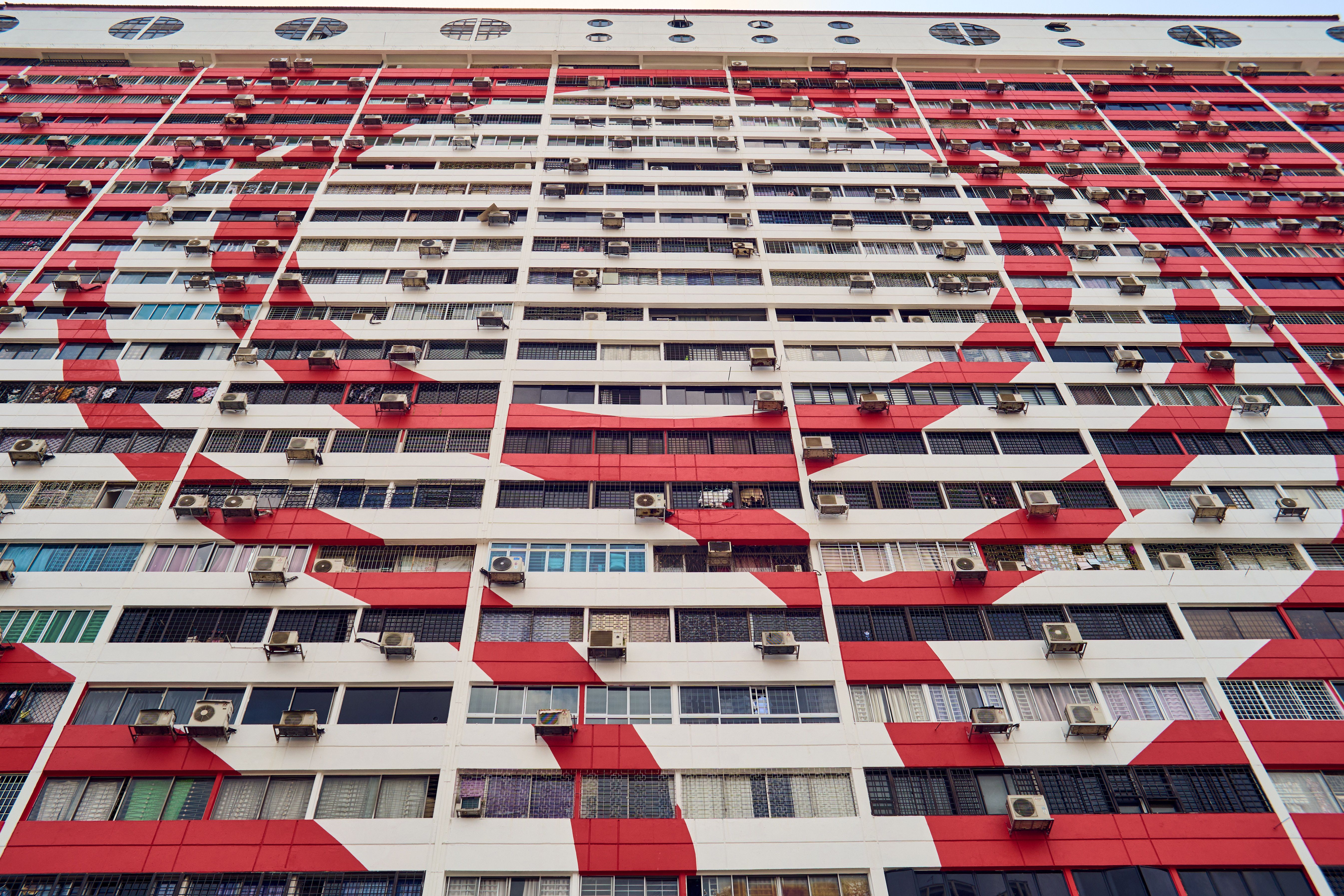 Colorful Geometric Patterns on High-Rise Building · Free Stock Photo