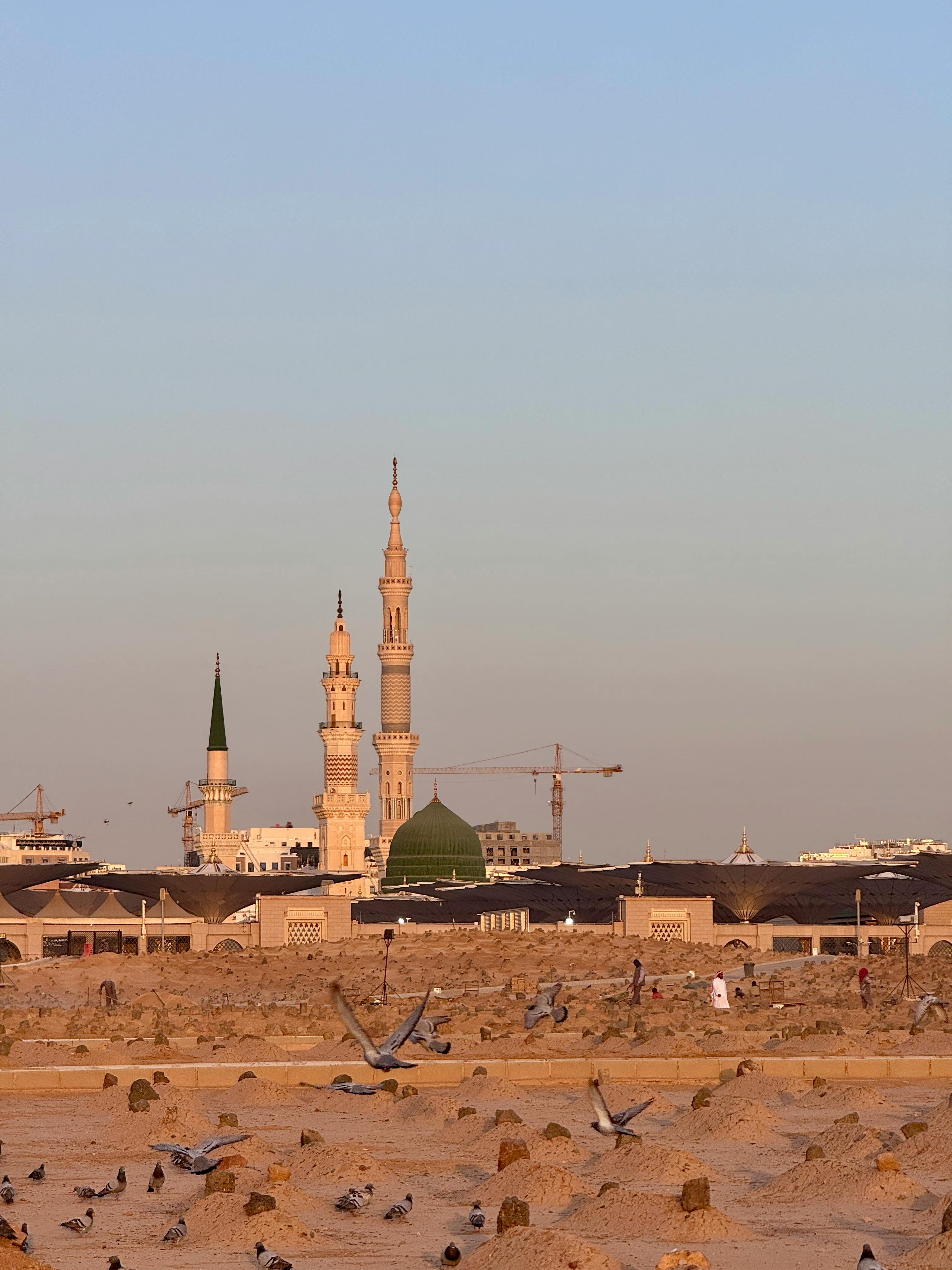 Captivating sunset view of Masjid Nabawi, a stunning architectural icon in Medina, Saudi Arabia.
