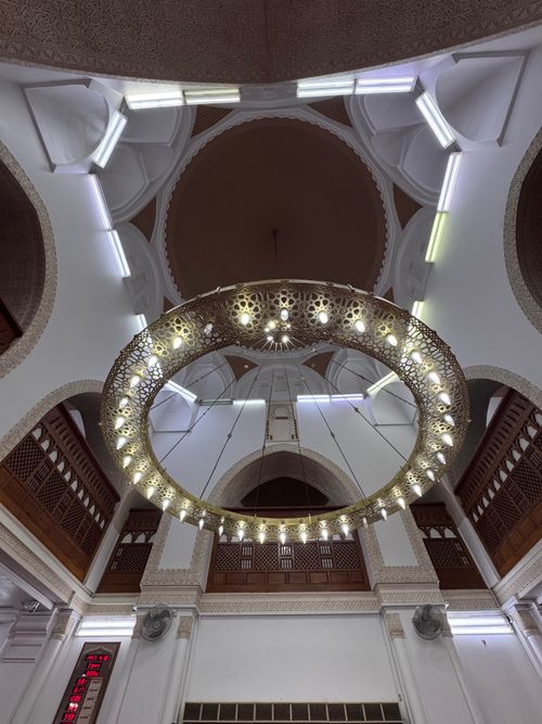 Free Intricate architectural details of a mosque's interior in Madinah, showcasing ornamental design. Stock Photo
