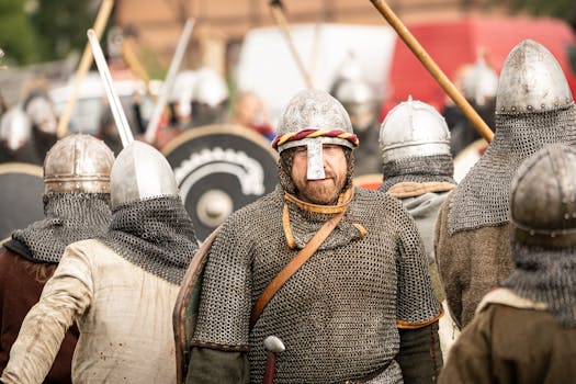 Viking reenactors in historical armor at a medieval festival in Szczecin, Poland.