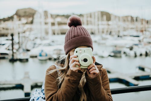 Woman Holding a Camera