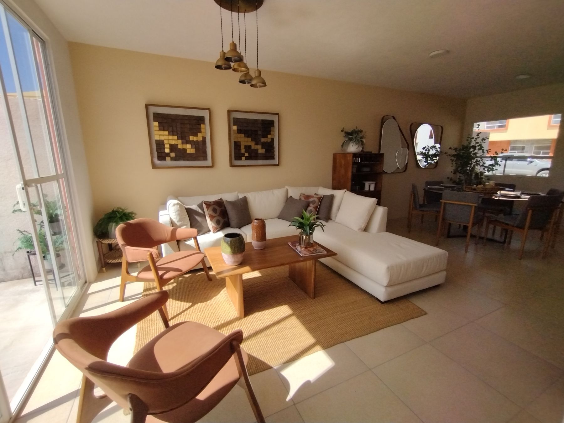 Bright living room with mid-century accents and abundant natural light