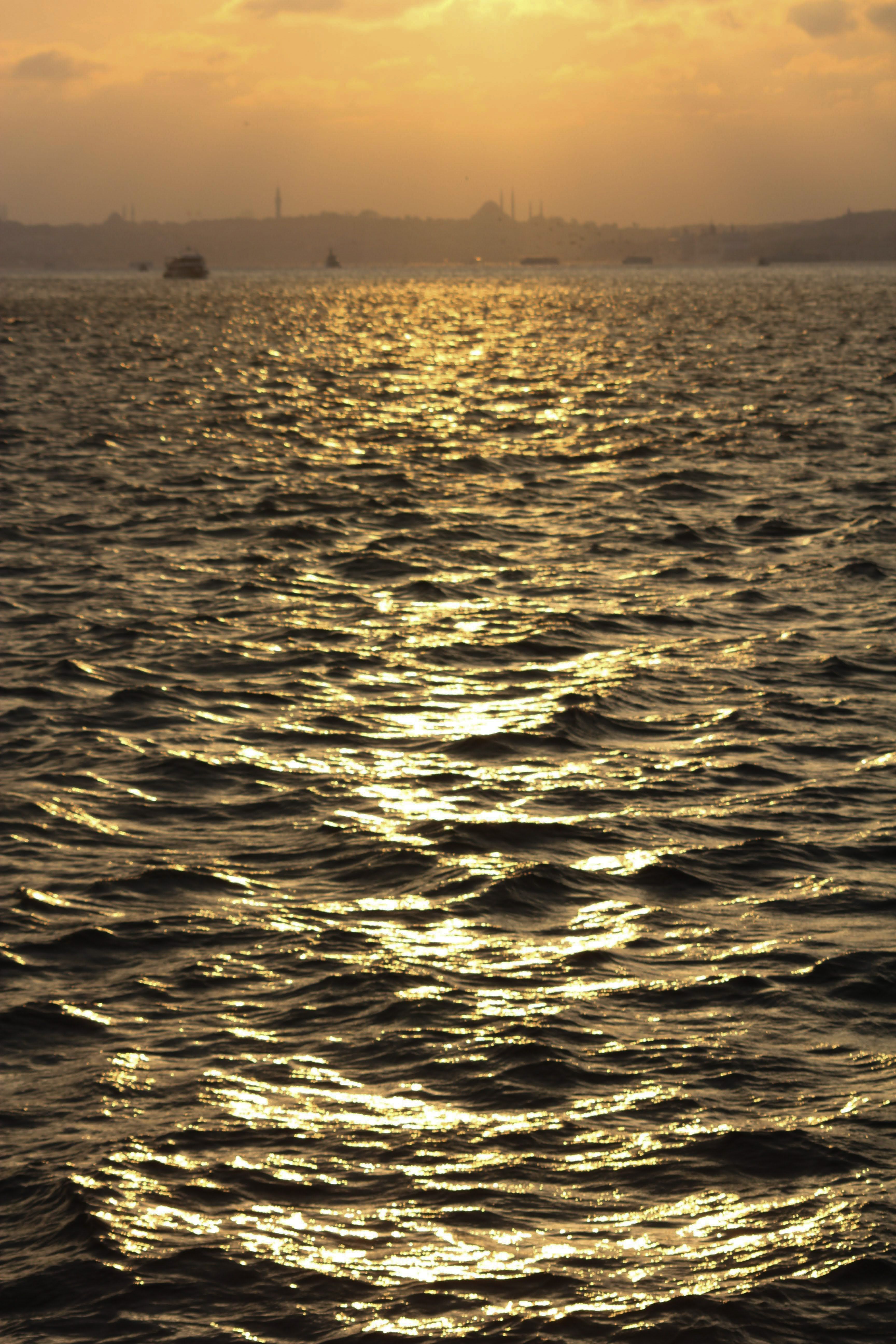 Golden Sunset Over Ocean Waves Landscape · Free Stock Photo