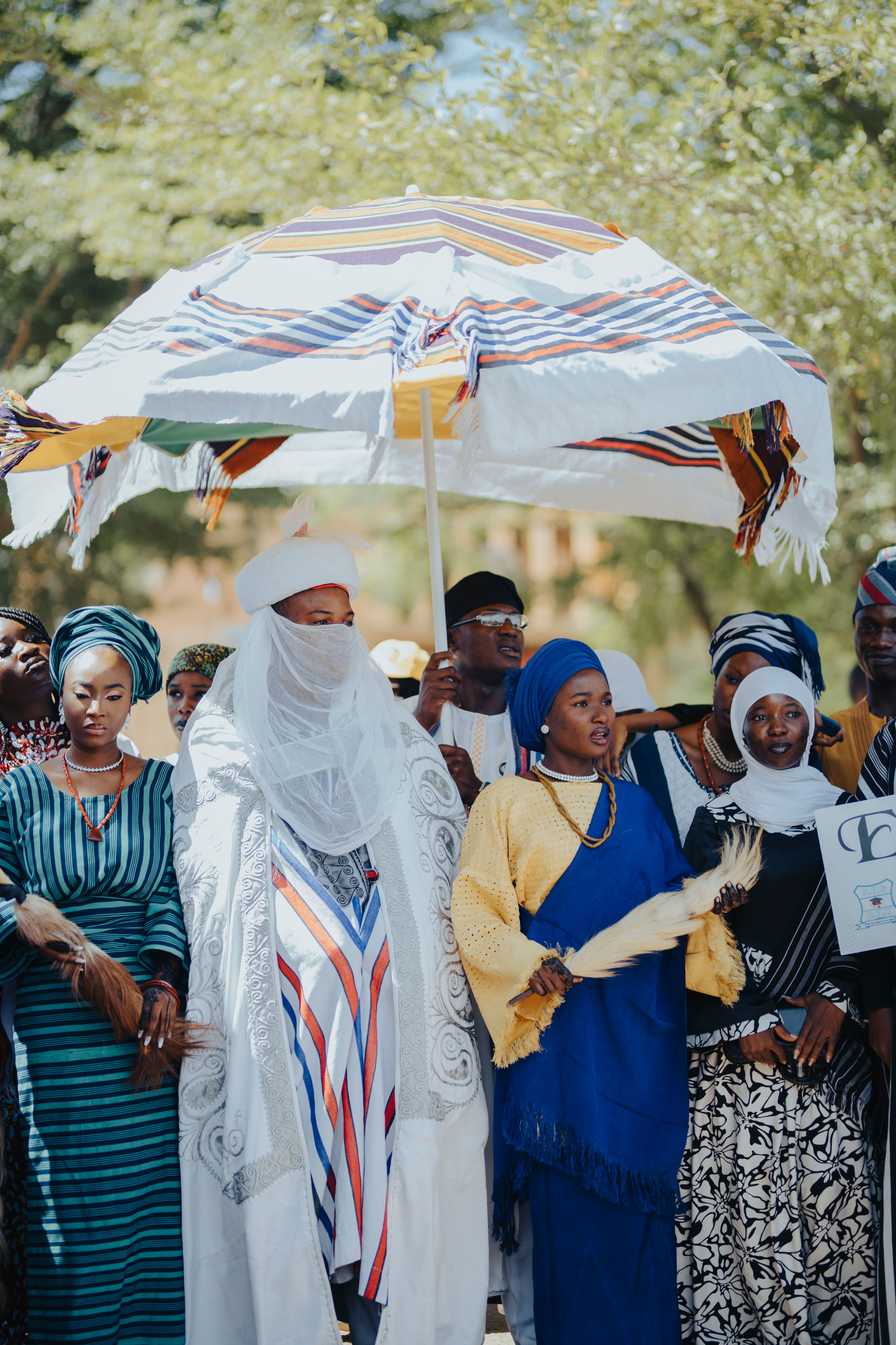 Traditional African Ceremony with Colorful Attire · Free Stock Photo