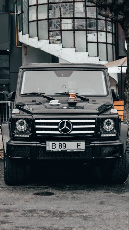 Silver Grey Mercedes-Benz G-Class Car Parked on a Street · Free Stock Photo