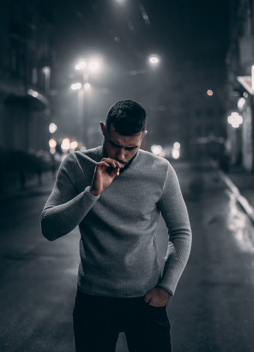 Photo Of Man Smoking Cigarettes