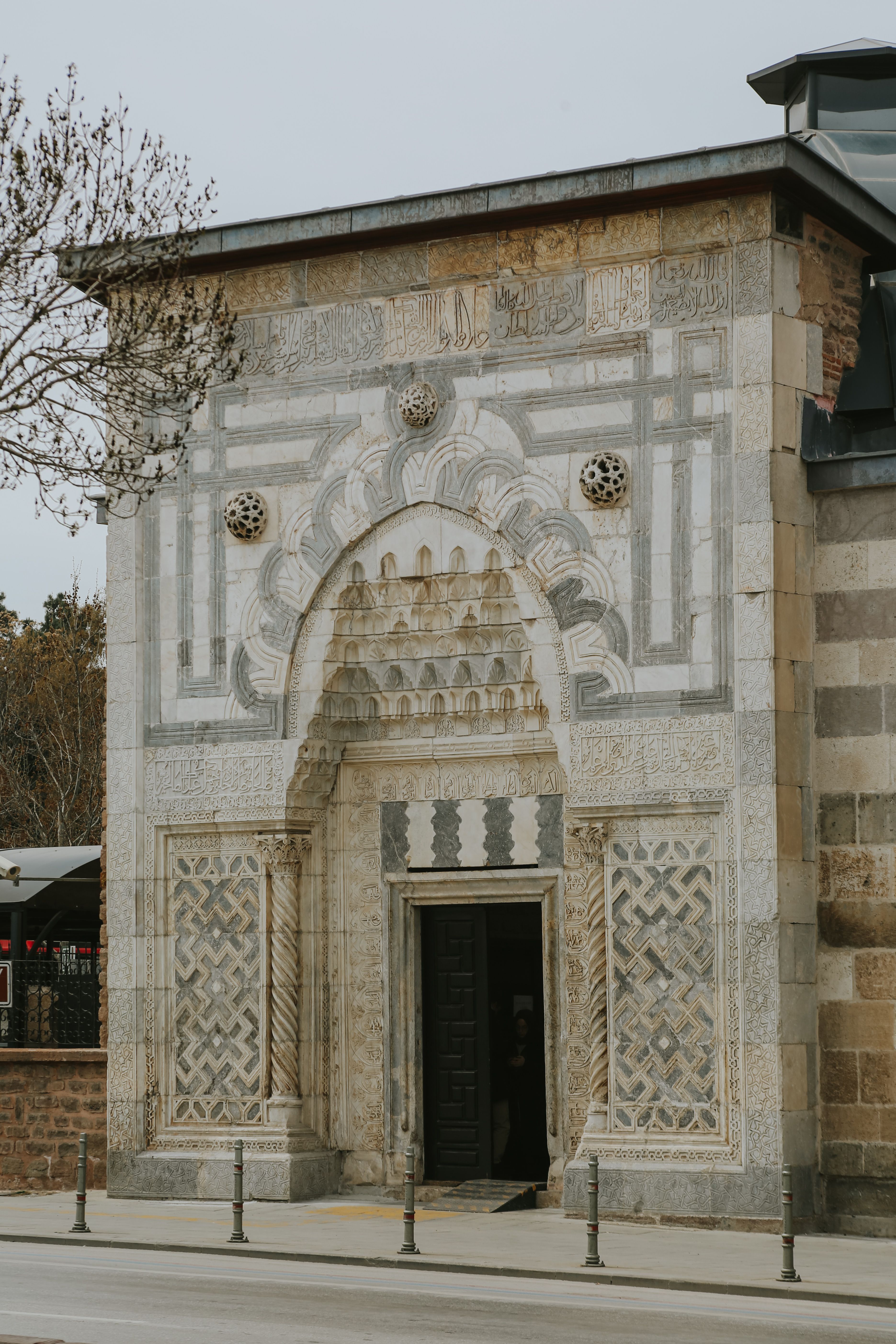 Intricate stone facade of an ancient structure with historical significance.
