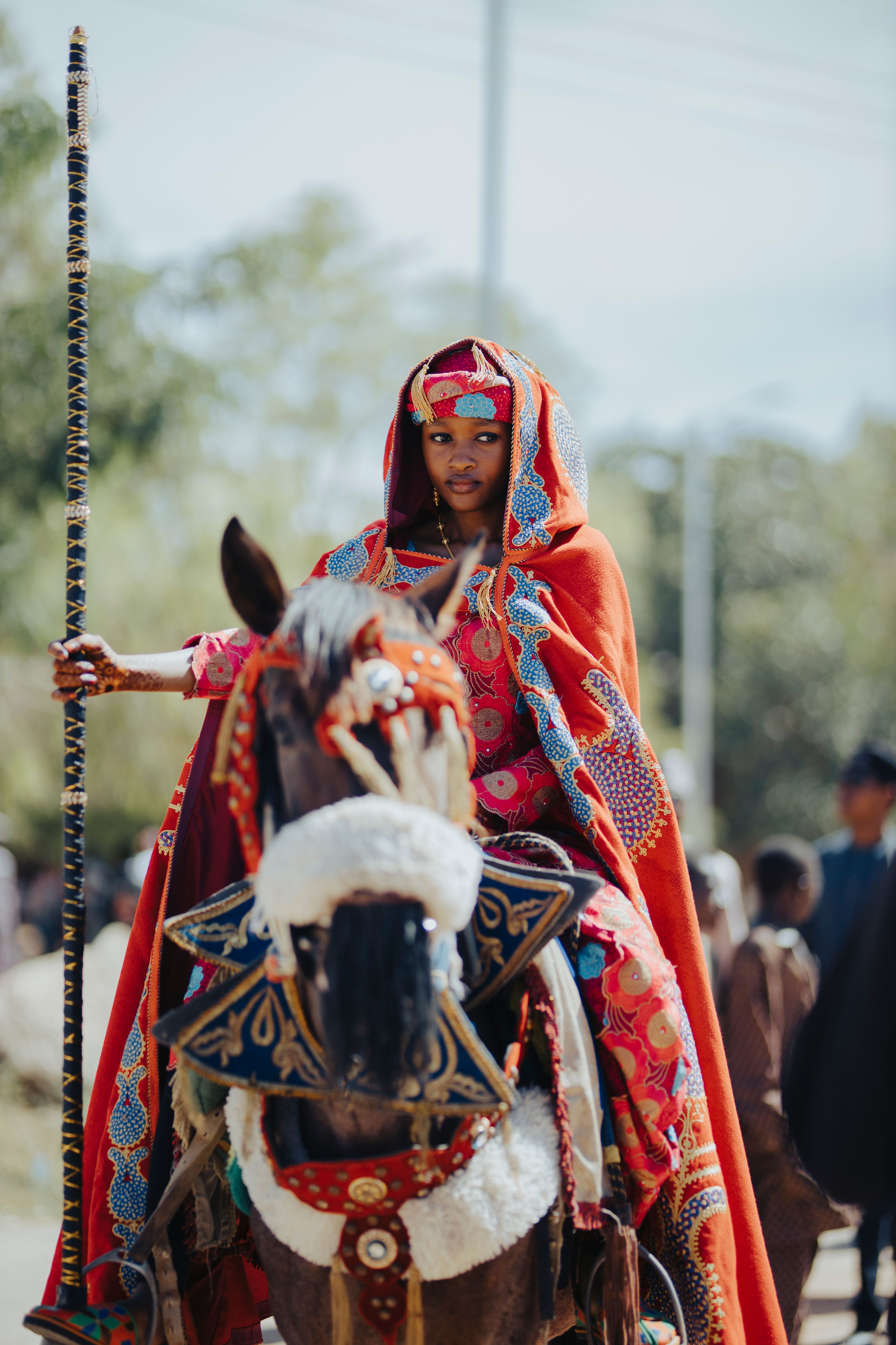 Traditional African Woman on Decorated Horseback · Free Stock Photo