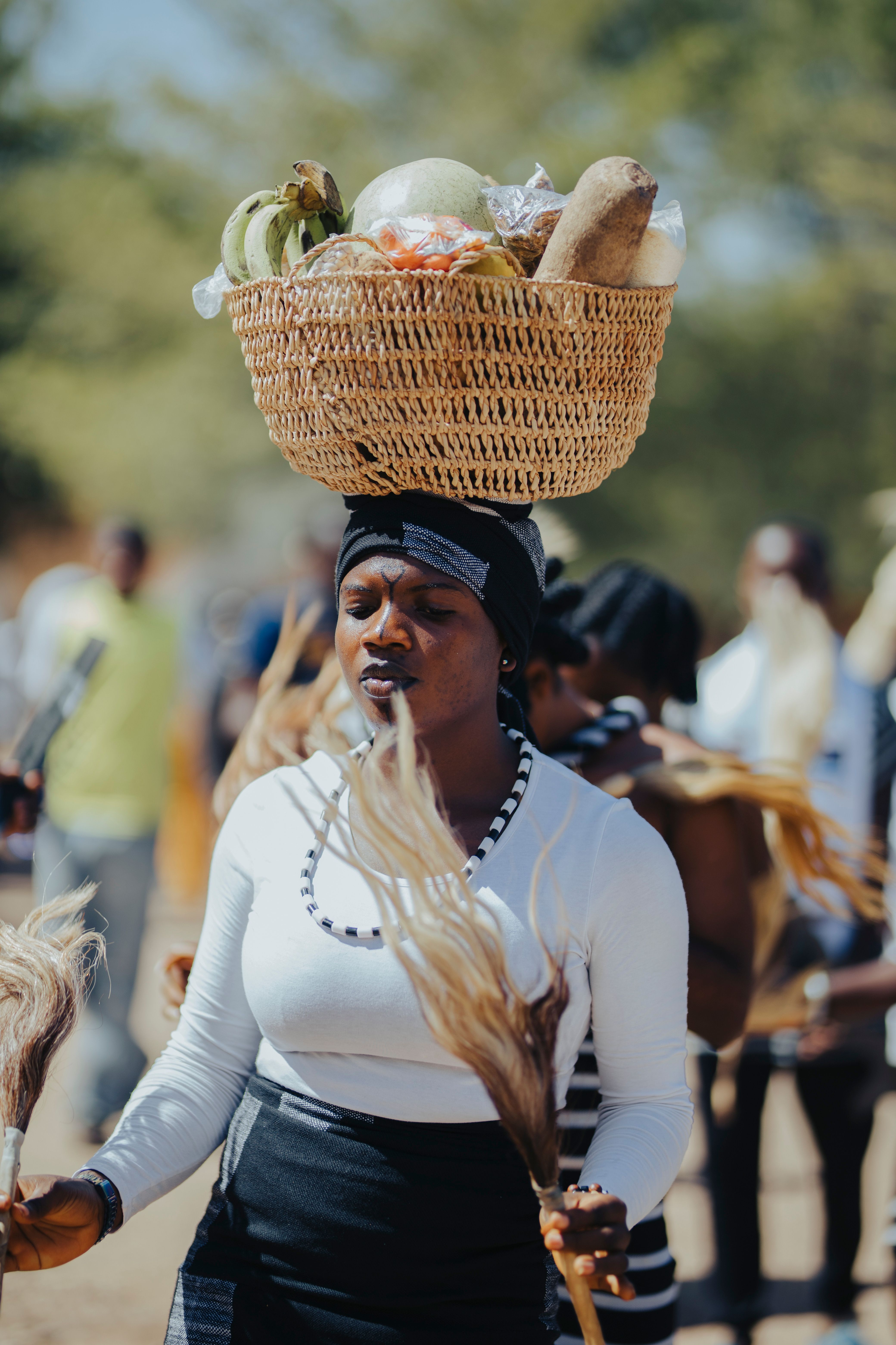 Traditional African Woman Balancing Basket · Free Stock Photo