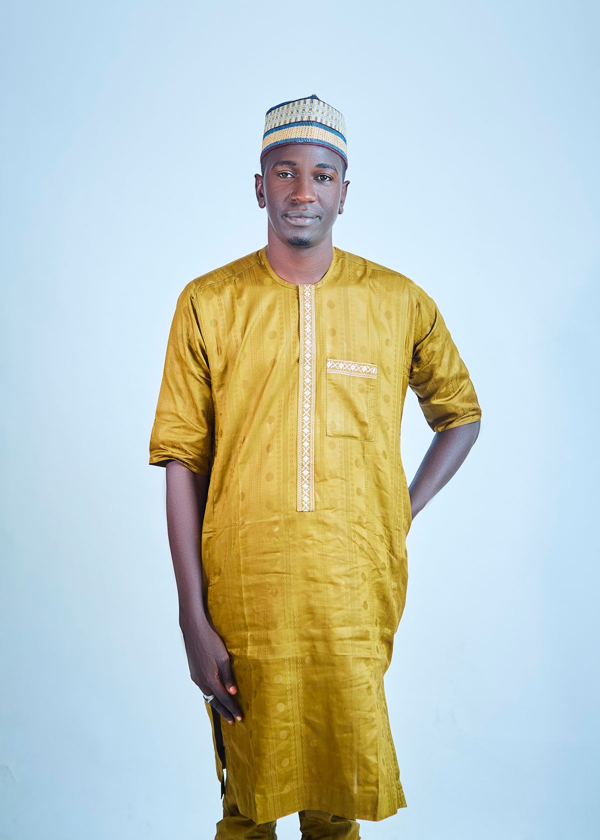 Man wearing an elegant golden traditional outfit
