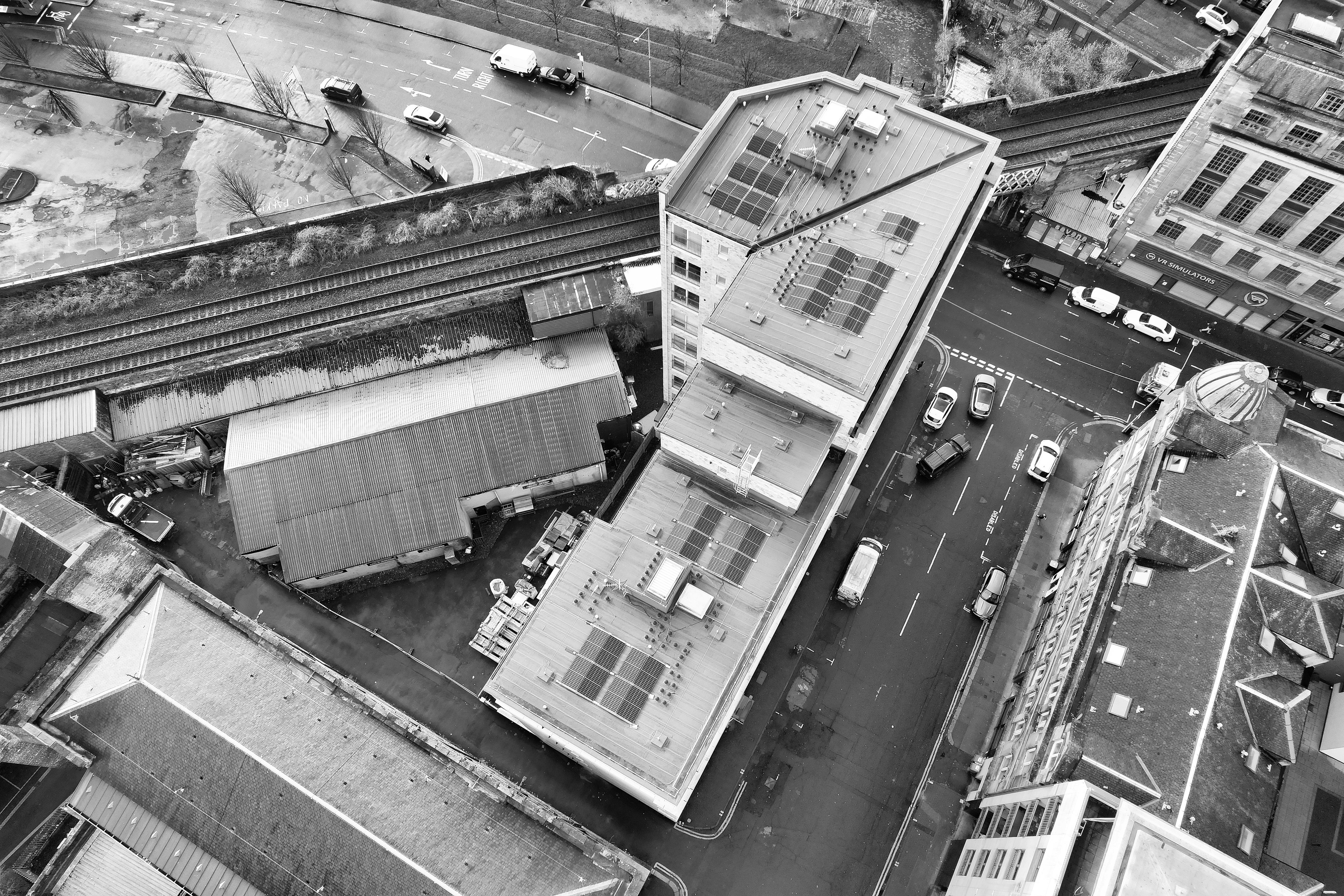 Aerial shot of Glasgow city center showcasing urban architecture and street layout.