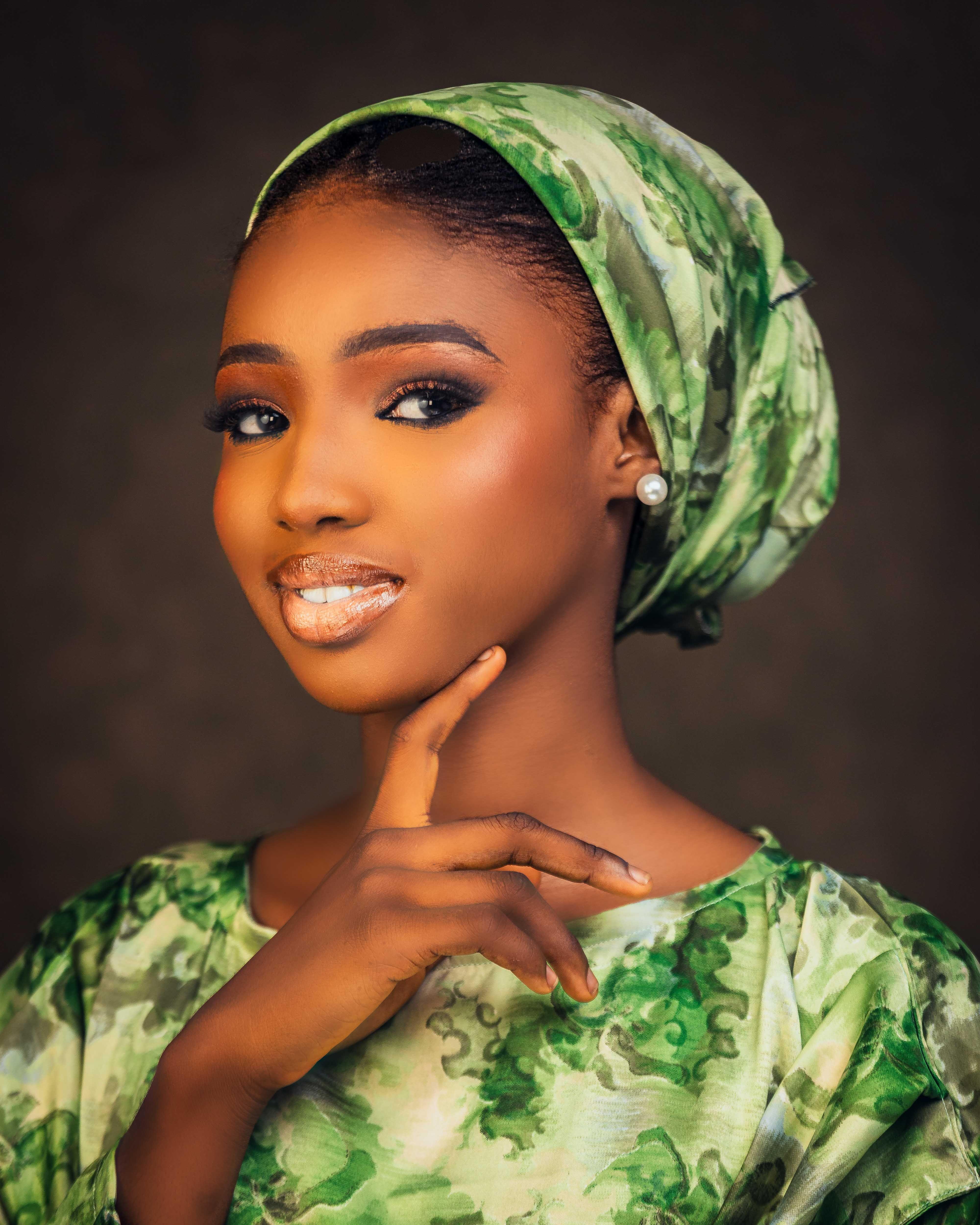 Portrait of Woman in Green Traditional Headscarf · Free Stock Photo