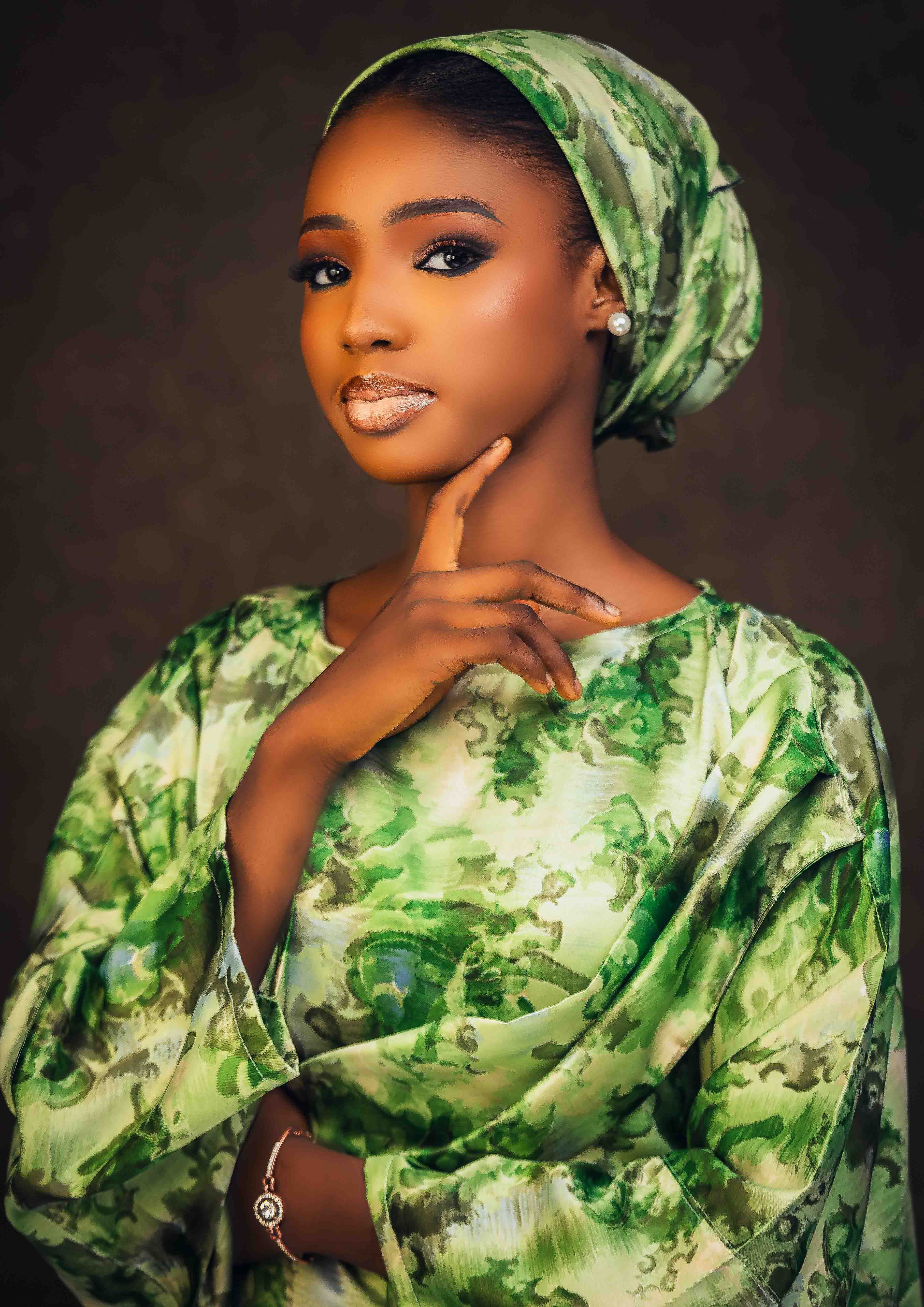 Portrait of Woman in Green Traditional Headscarf · Free Stock Photo