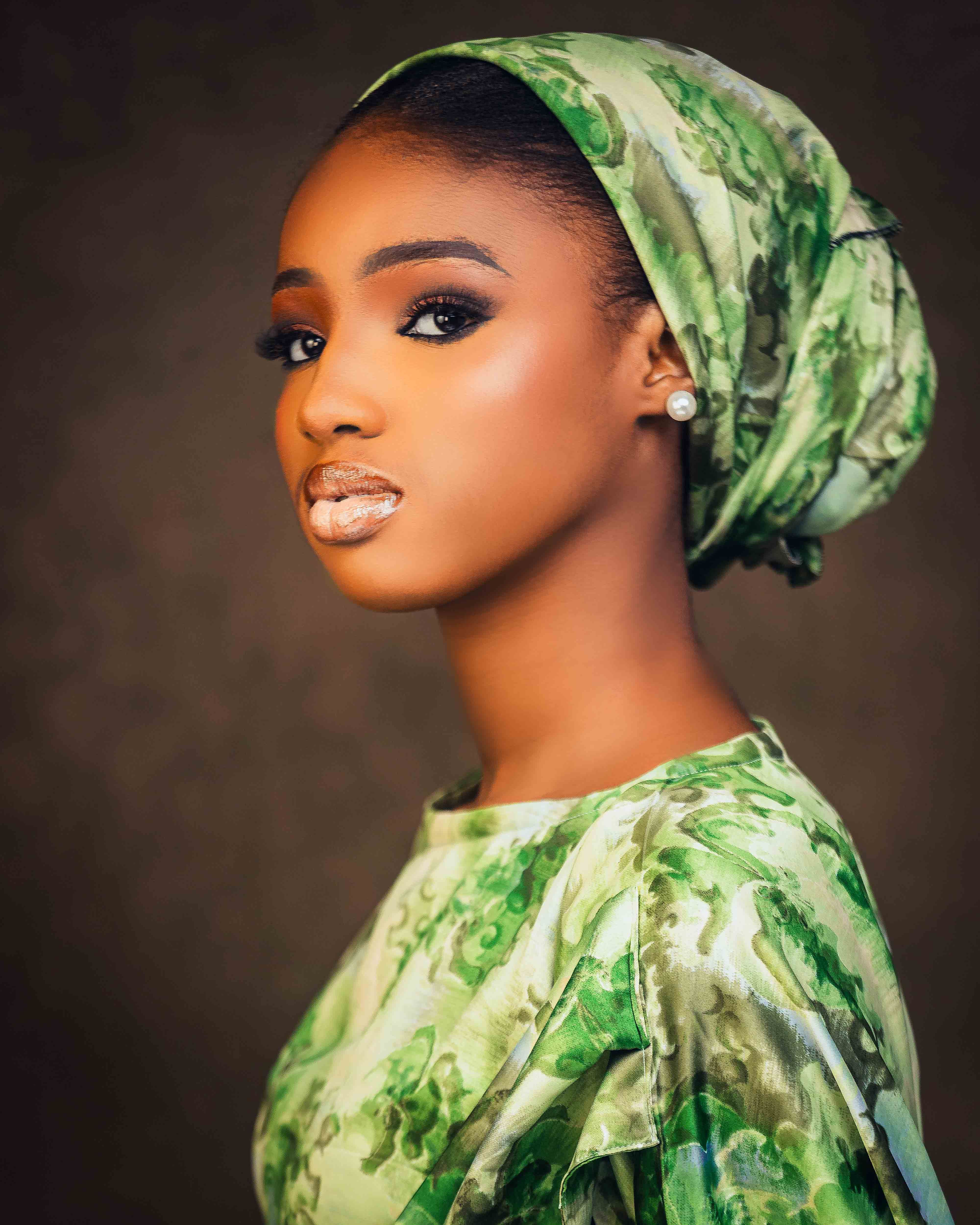 Portrait of Woman in Green Traditional Headscarf · Free Stock Photo