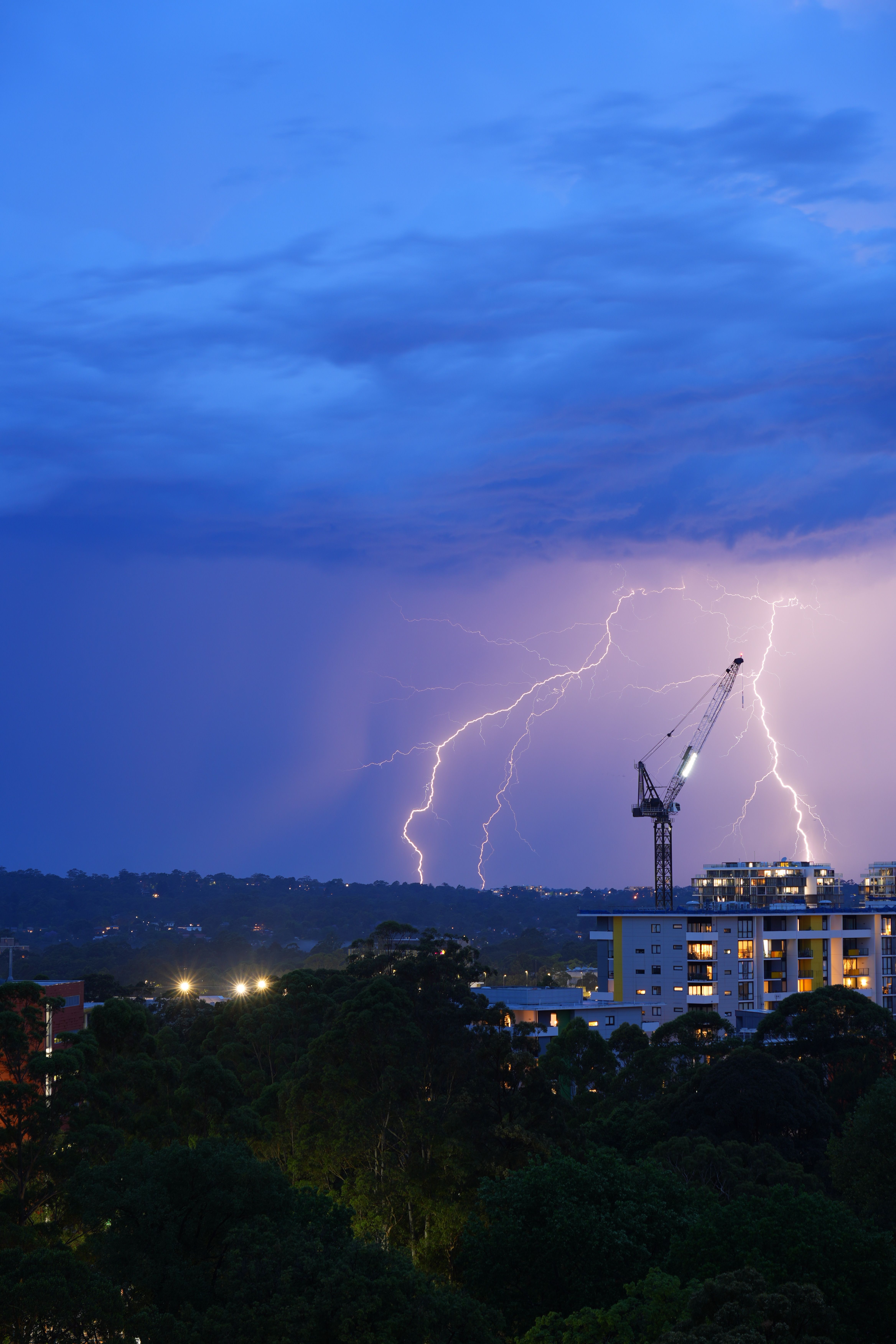 Dramatic Nighttime Lightning Over Cityscape · Free Stock Photo