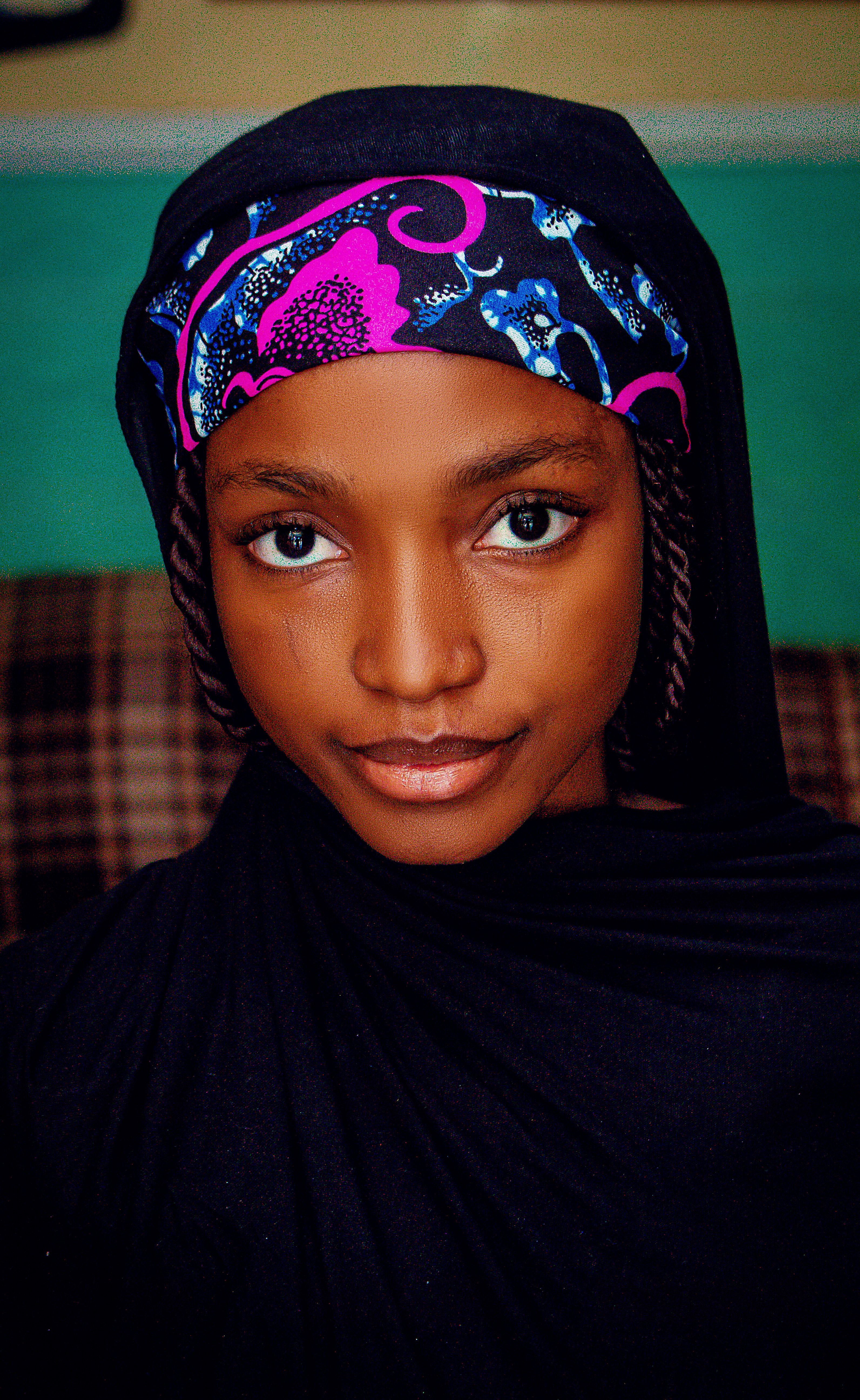 Portrait of Woman in Vibrant Headscarf and Hijab · Free Stock Photo