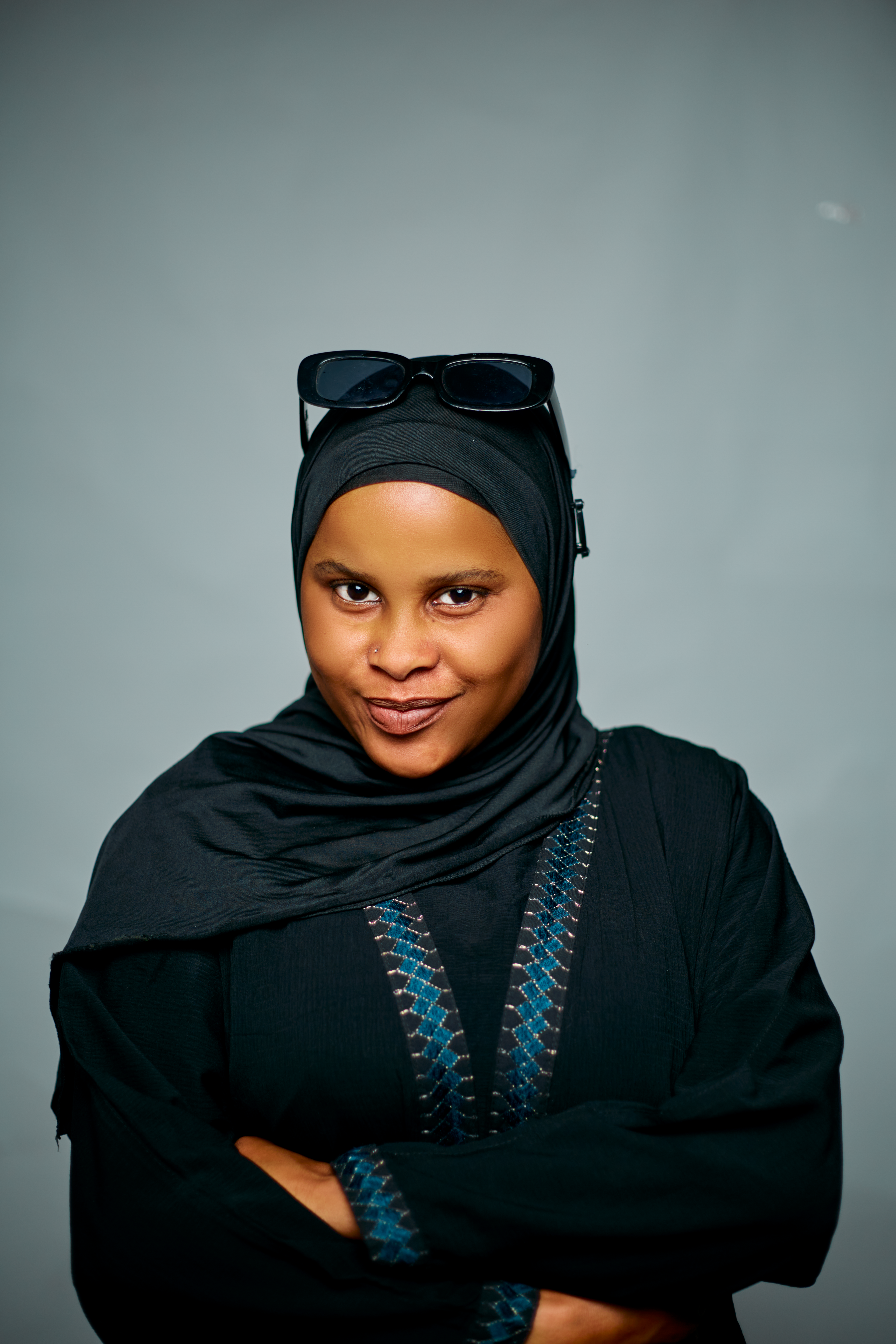 Confident Woman in Hijab with Glasses Portrait · Free Stock Photo