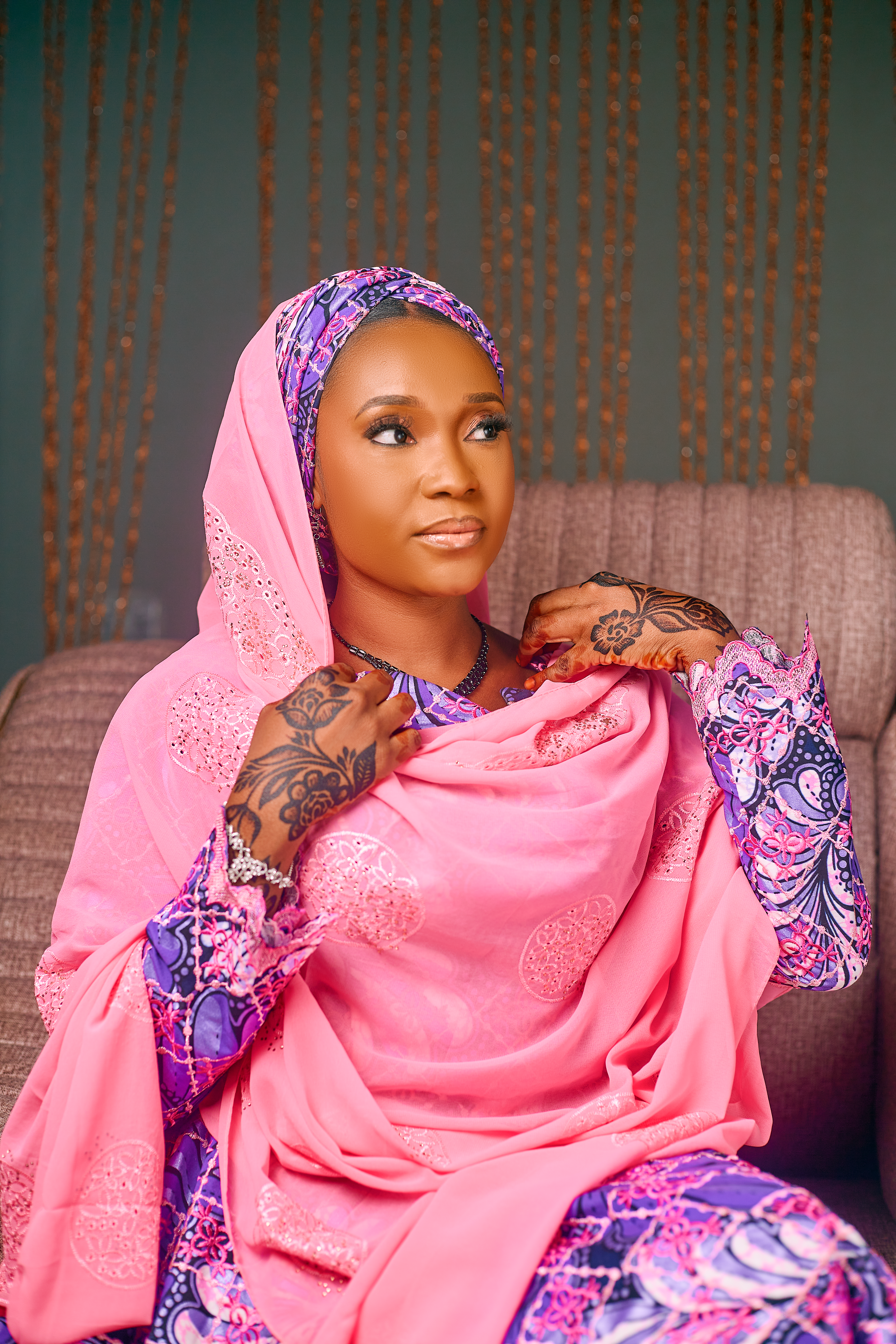 Elegant Woman in Traditional Pink Attire with Henna · Free Stock Photo