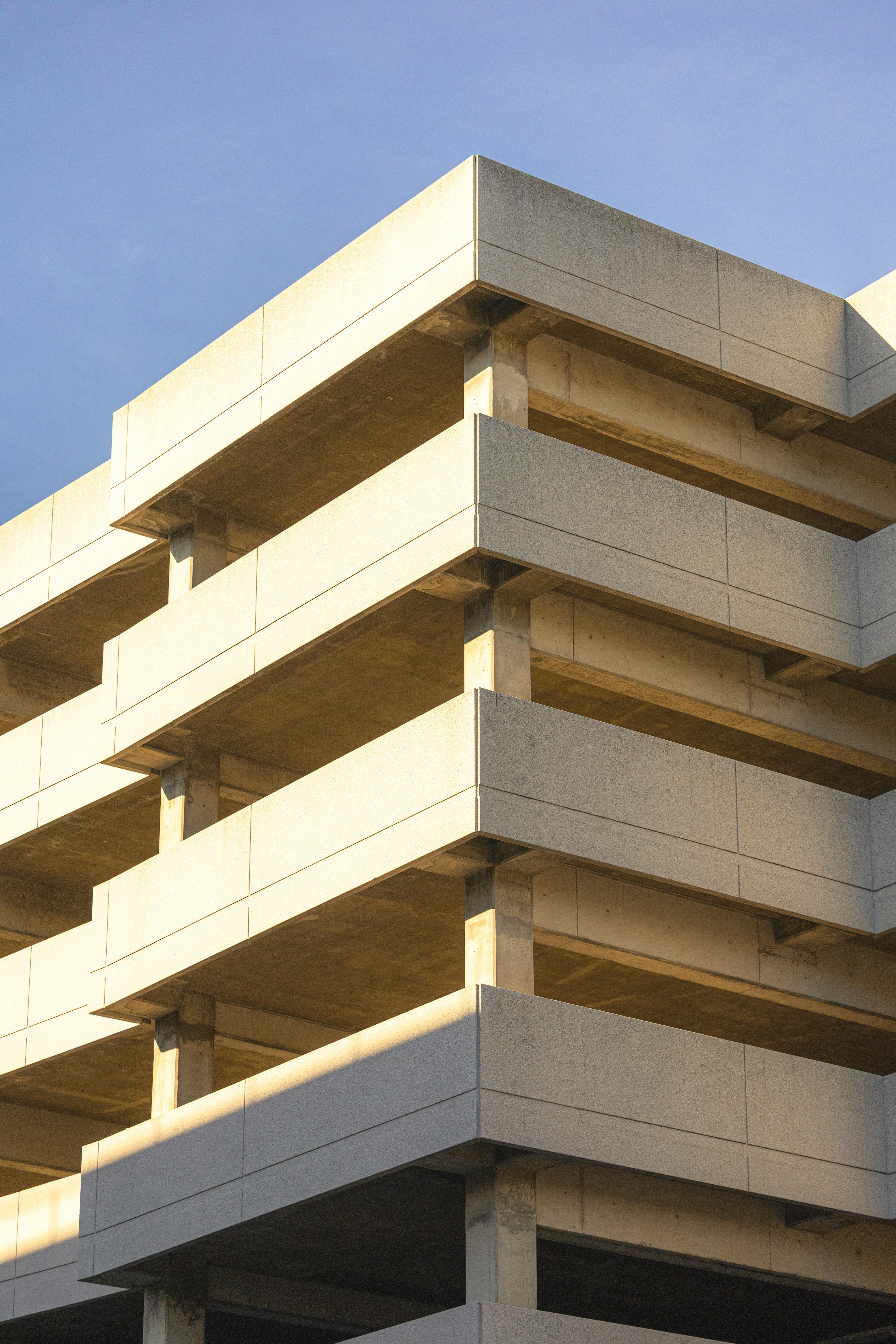 Modern concrete parking structure with exposed structural lines