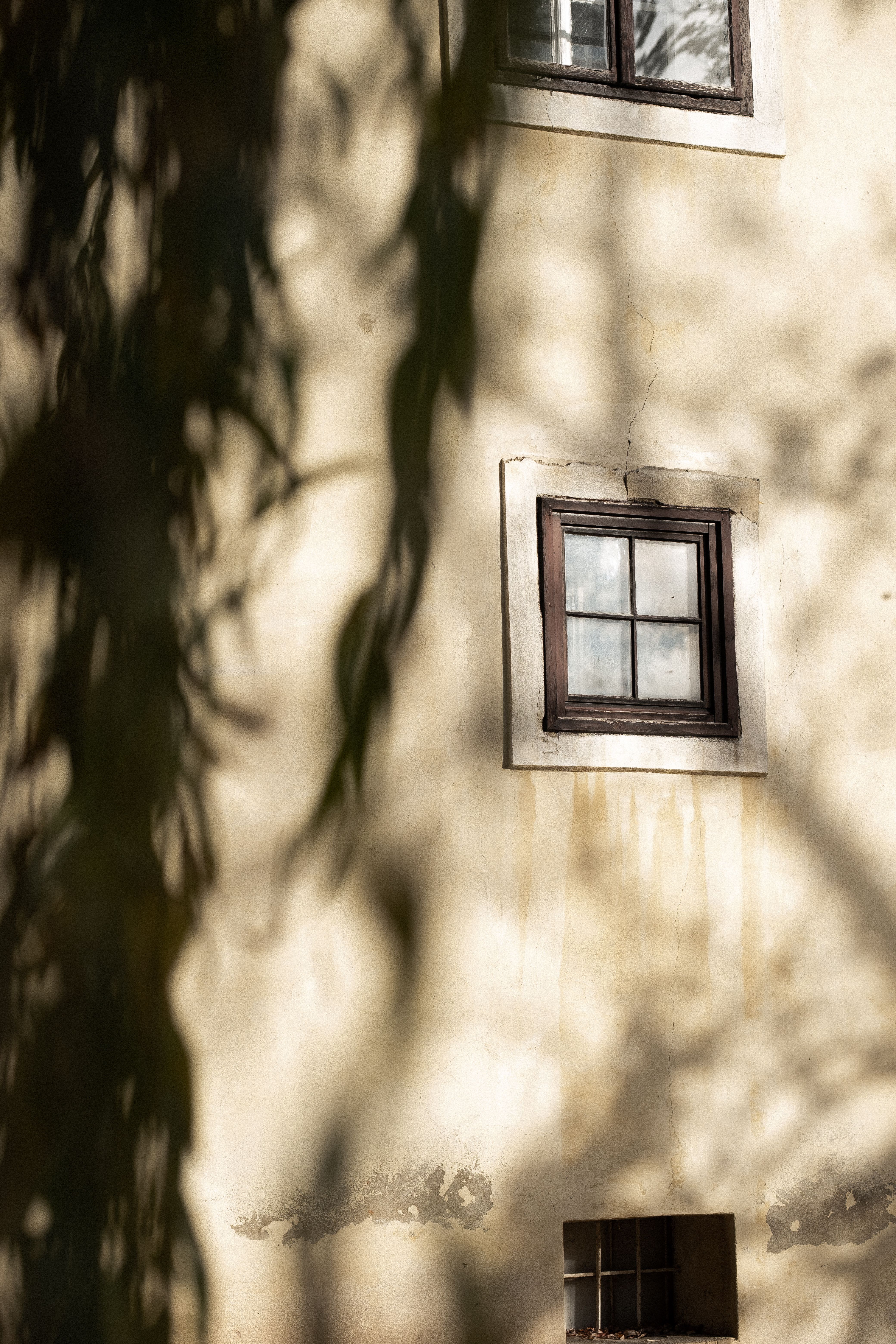 Charming Vintage Window with Sunlit Shadows · Free Stock Photo