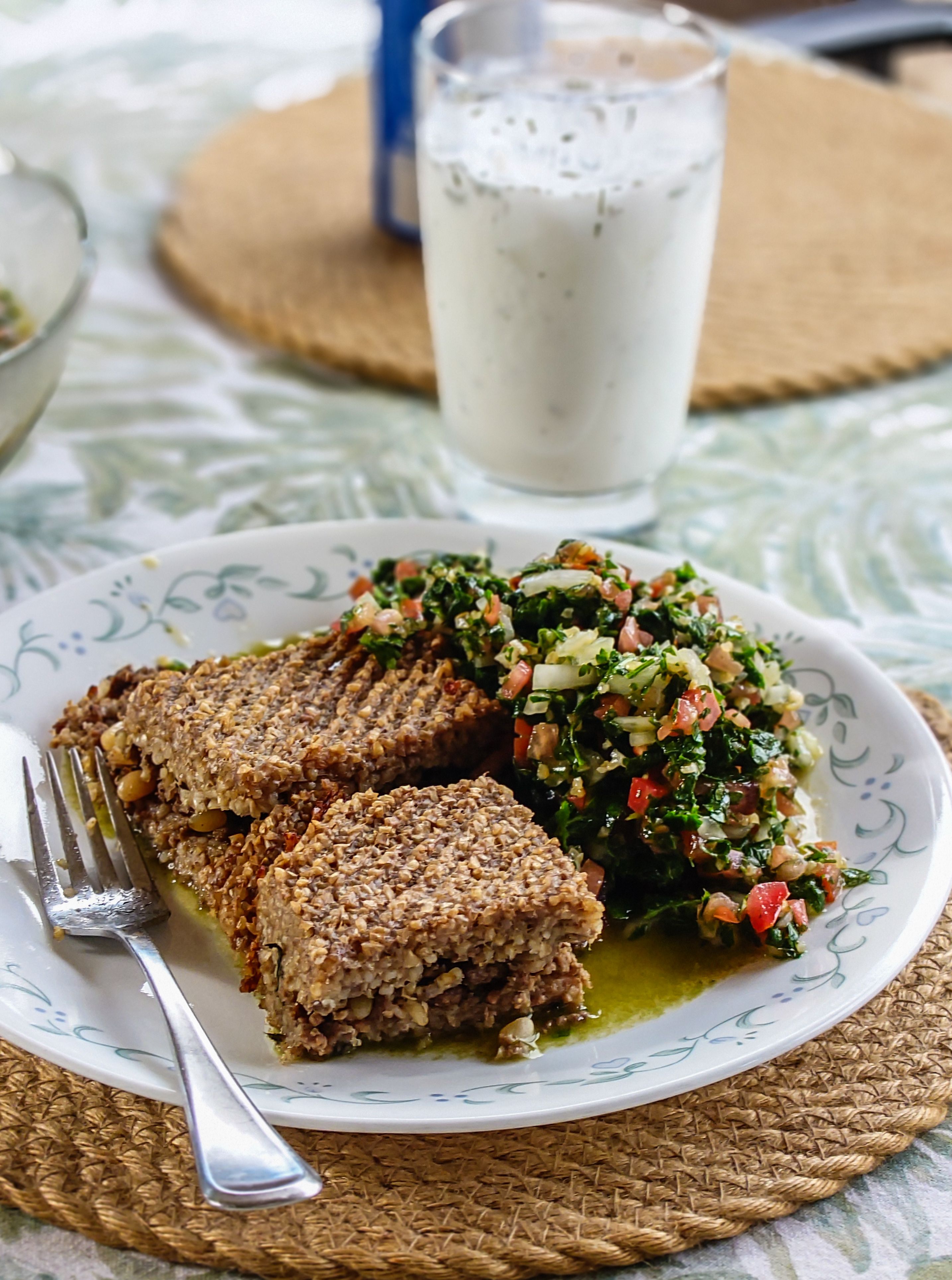 Lebanese Kibbeh and Tabouleh Salad on Dining Table · Free Stock Photo