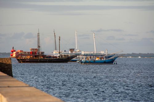 Free Charming traditional boats moored in Porto Seguro, Bahia, capturing the serene coastal ambiance. Stock Photo