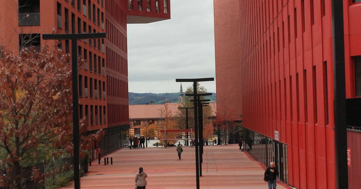 Red College Modern Architectural Campus with Red Facades · Free Stock Photo