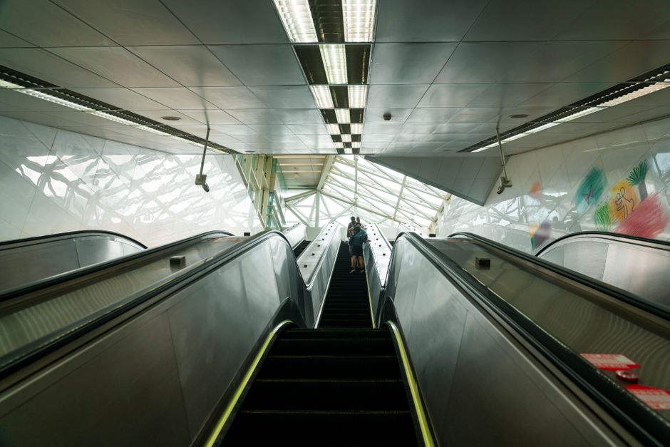 Clean and modern interior of a Dubai Metro station, highlighting convenient transport links for hotels.