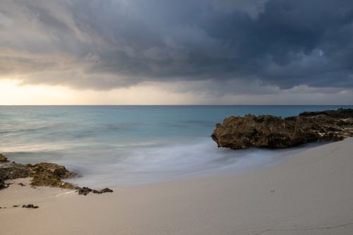 Free Captivating stormy seascape with rocky shores at Quintana Roo, Mexico. Stock Photo