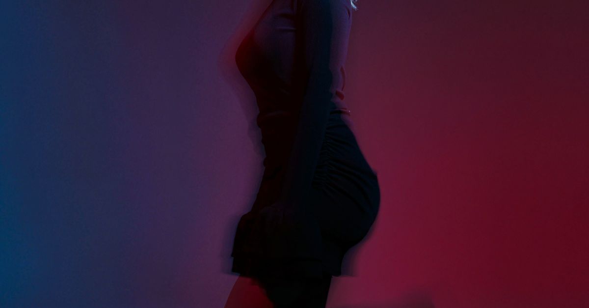 Blue Light Body Raps Artistic Motion Blur of Woman in Red and Blue Light · Free Stock Photo