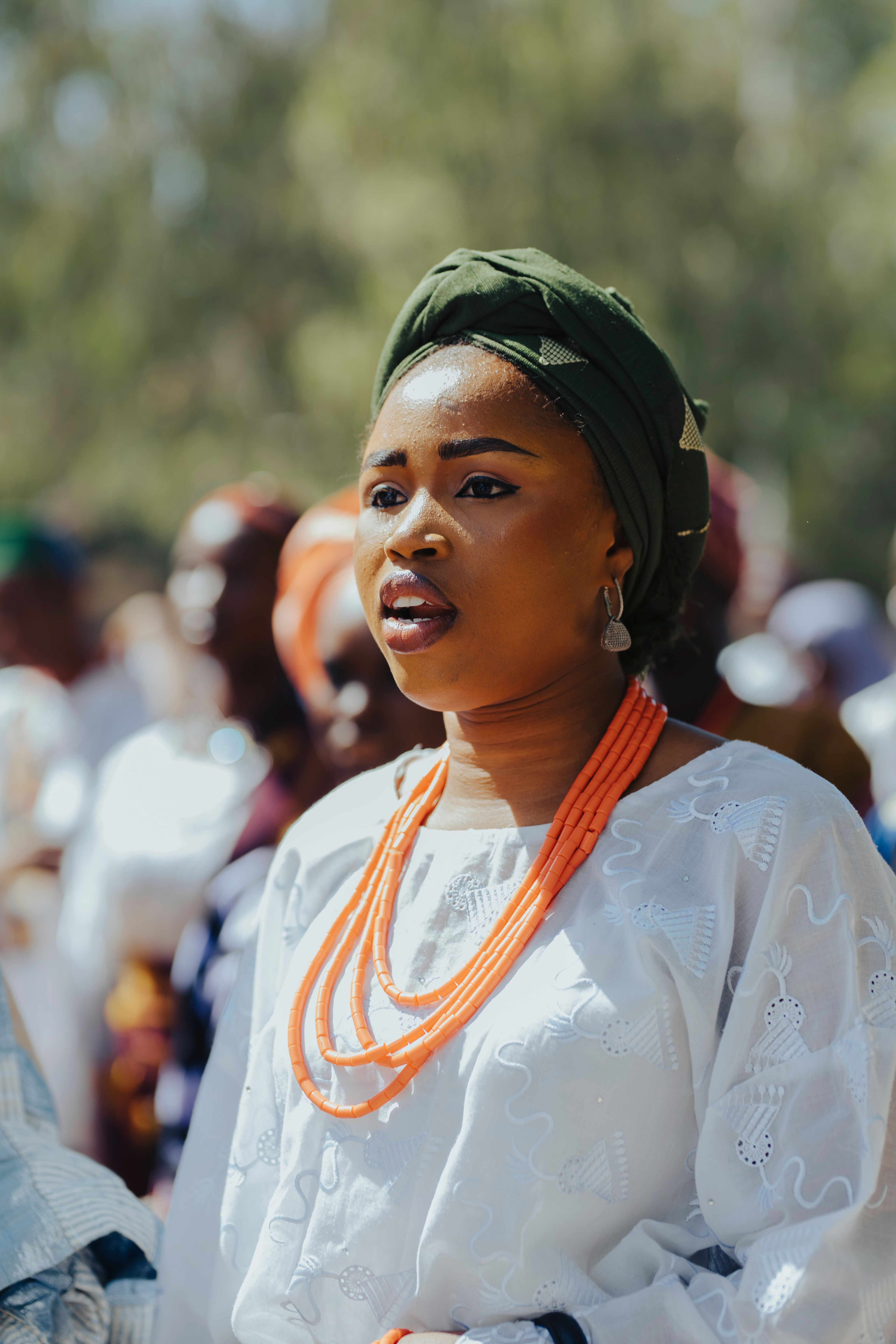 Vibrant Traditional Attire at Outdoor Event · Free Stock Photo