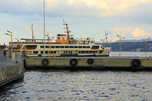 Free A classic ferry docked at Karaköy with the Bosphorus backdrop in Istanbul, Türkiye. Stock Photo