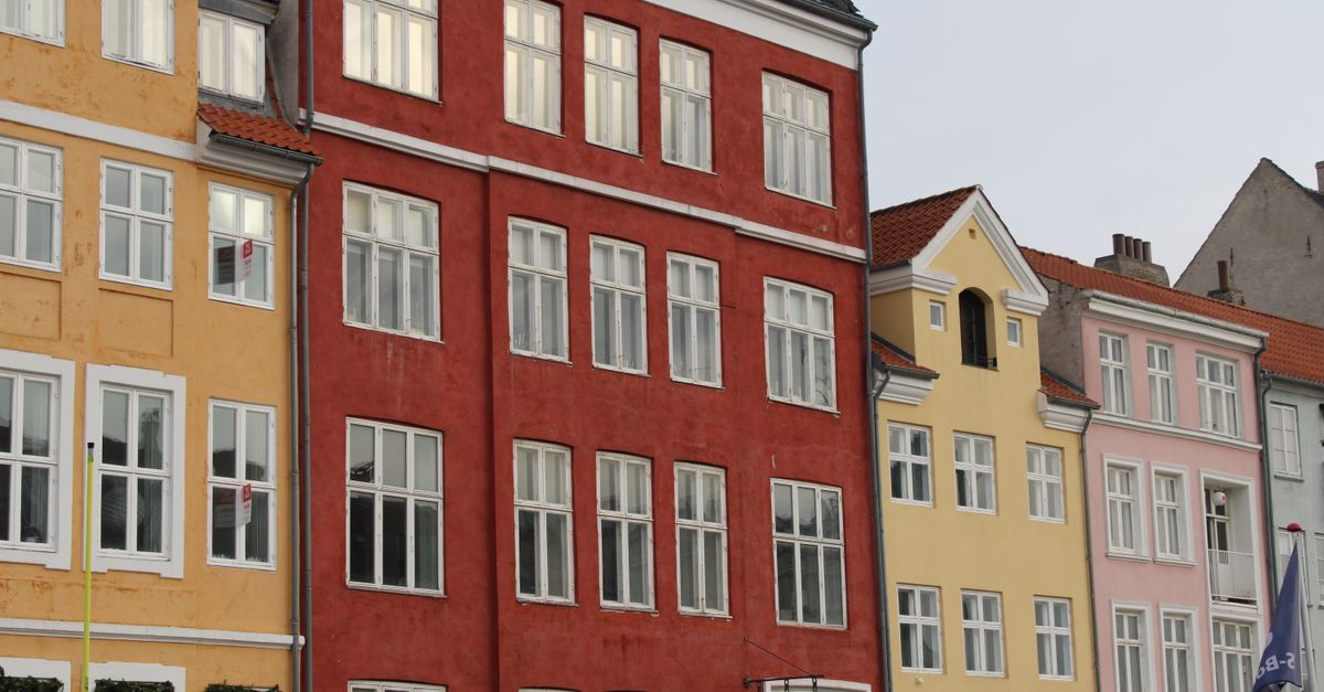 Vibrant facades of historic buildings in Copenhagen, Denmark.