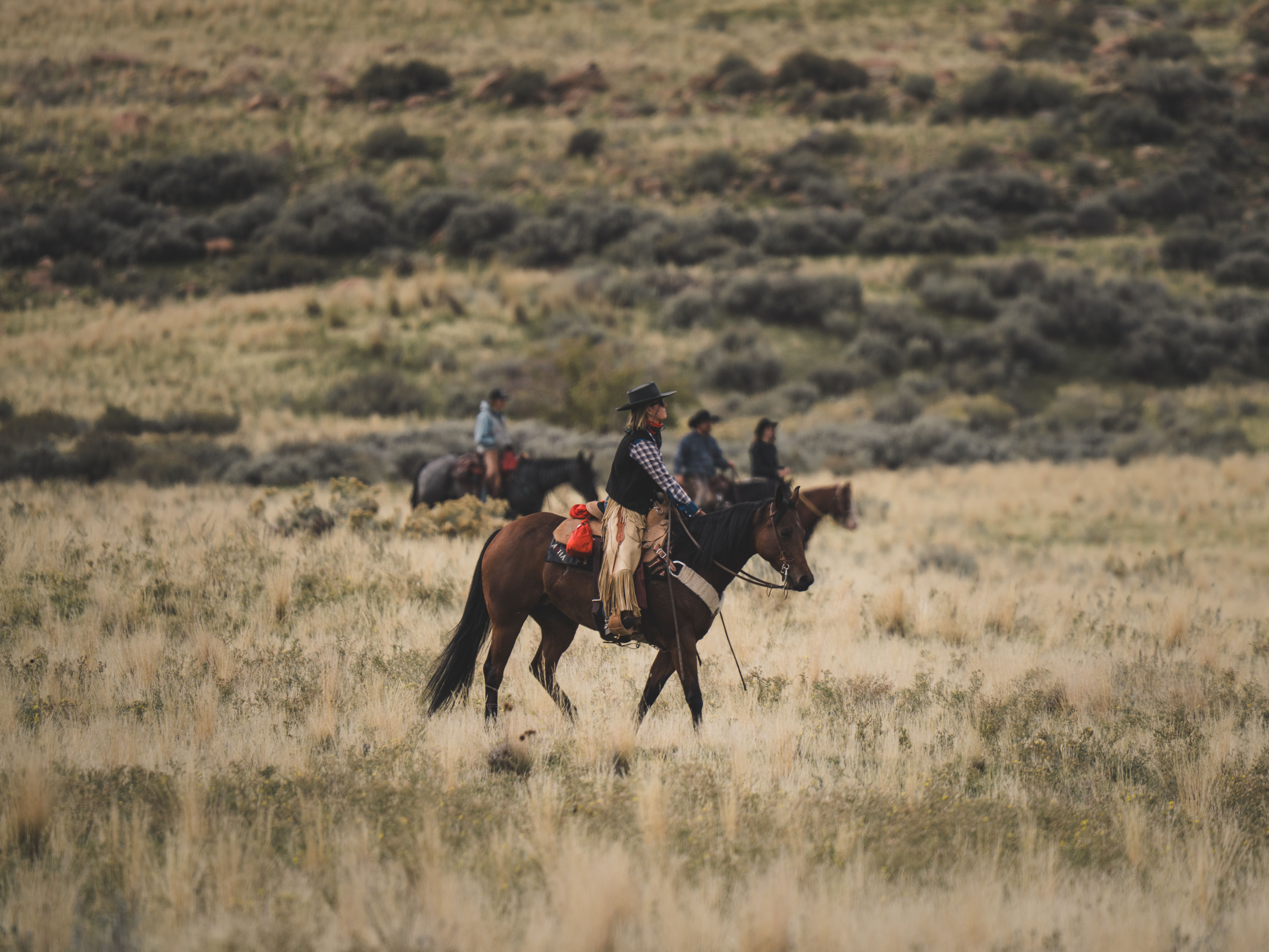 Cowboys Riding Through Scenic Utah Landscape · Free Stock Photo