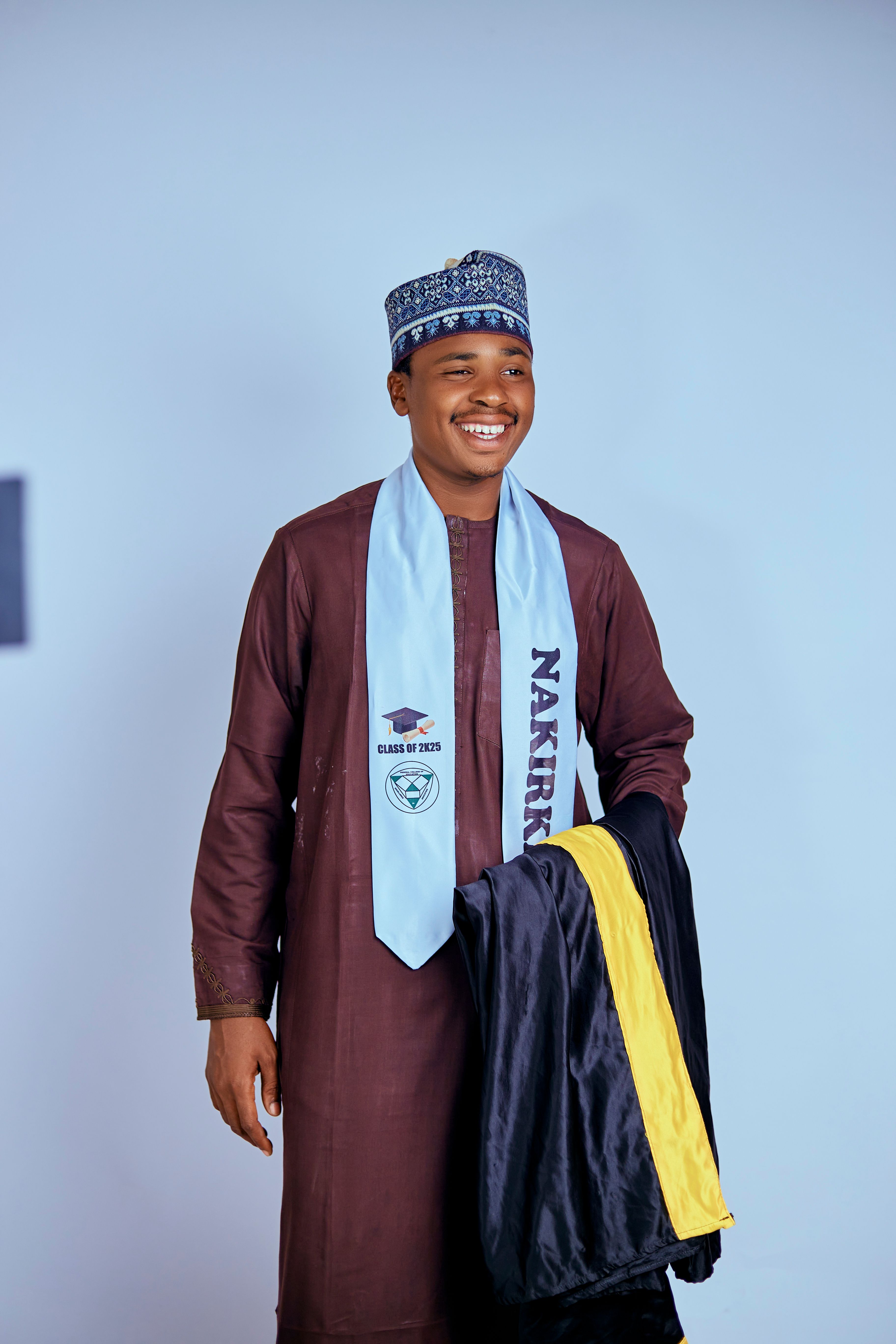 Young Adult in Traditional Outfit Graduating · Free Stock Photo