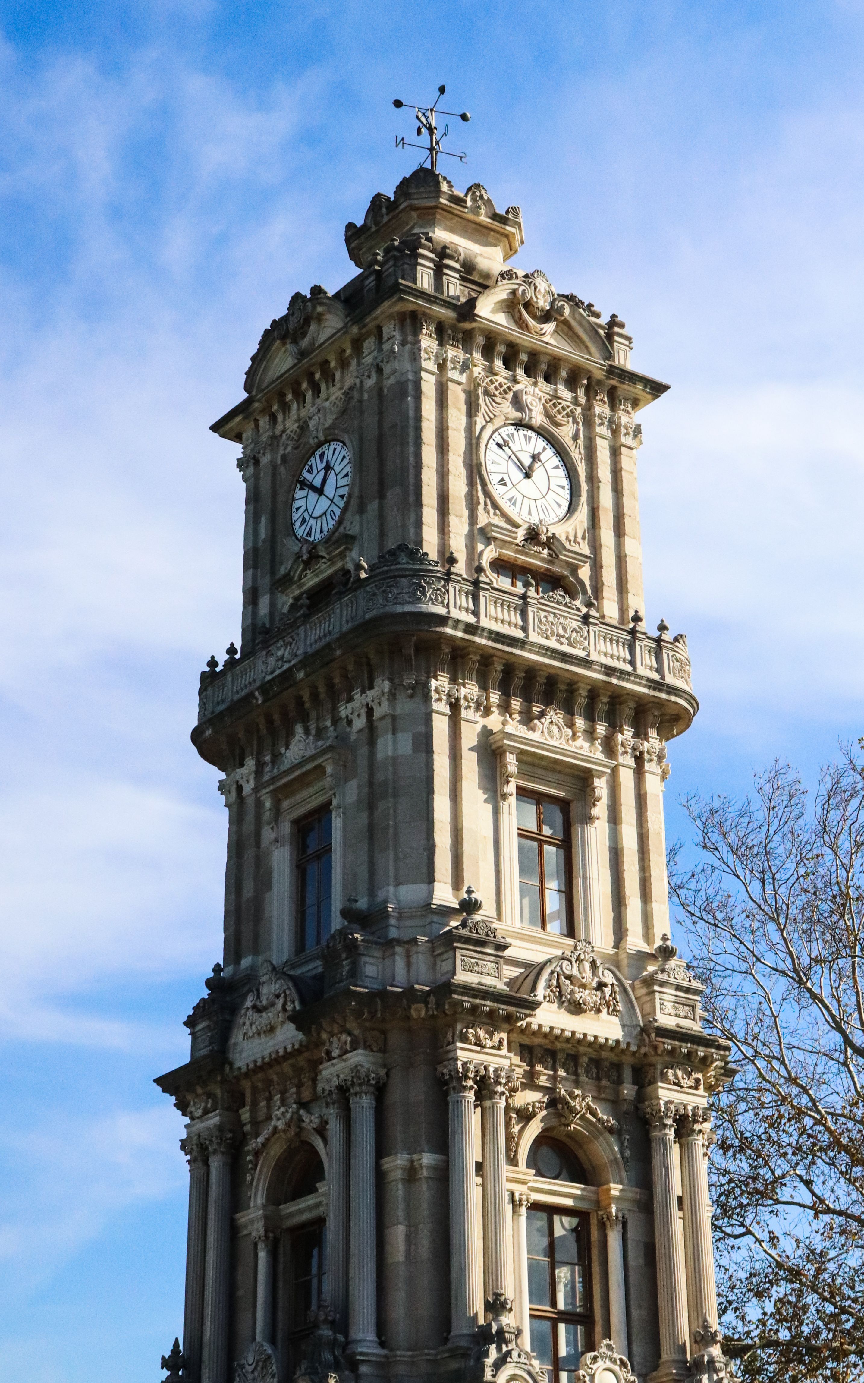 Historic Clock Tower Against Blue Sky · Free Stock Photo