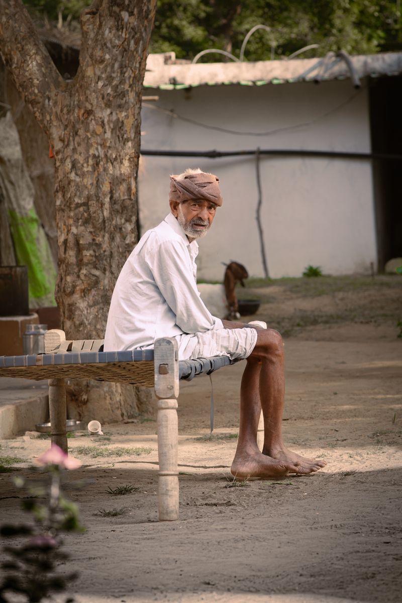 Elderly man being assisted at home
