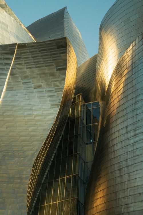 Free Close-up view of abstract modern architecture with metallic textures in sunlight. Stock Photo